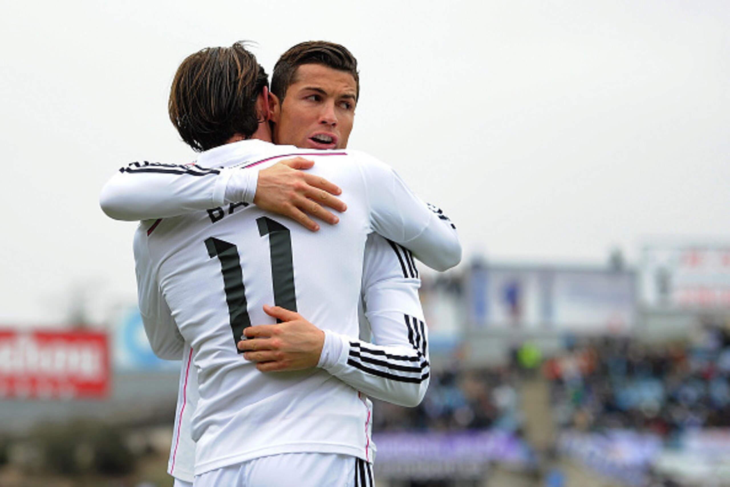 GETAFE, SPAIN - JANUARY 18: Gareth Bale of Real Madrid celebrates with Cristiano Ronaldo after scoring his team's 2nd goal during the La Liga match between Getafe CF and Real Madrid CF at Coliseum Alfonso Perez stadium on January 18, 2015 in Getafe, Spai GETAFE, SPAIN - JANUARY 18: Gareth Bale of Real Madrid celebrates with Cristiano Ronaldo after scoring his team's 2nd goal during the La Liga match between Getafe CF and Real Madrid CF at Coliseum Alfonso Perez stadium on January 18, 2015 in Getafe, Spai