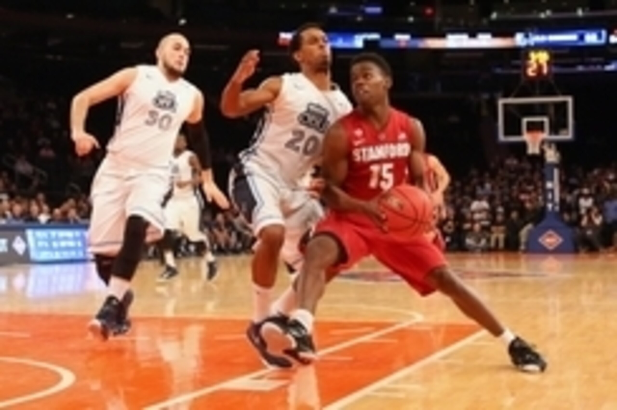 Mar 31, 2015; New York, NY, USA; Stanford Cardinal guard Marcus Allen (15) drives past Old Dominion Monarchs guard Trey Freeman (20) during the second half in the semifinals of the 2015 NIT college basketball tournament at Madison Square Garden. Stanford 