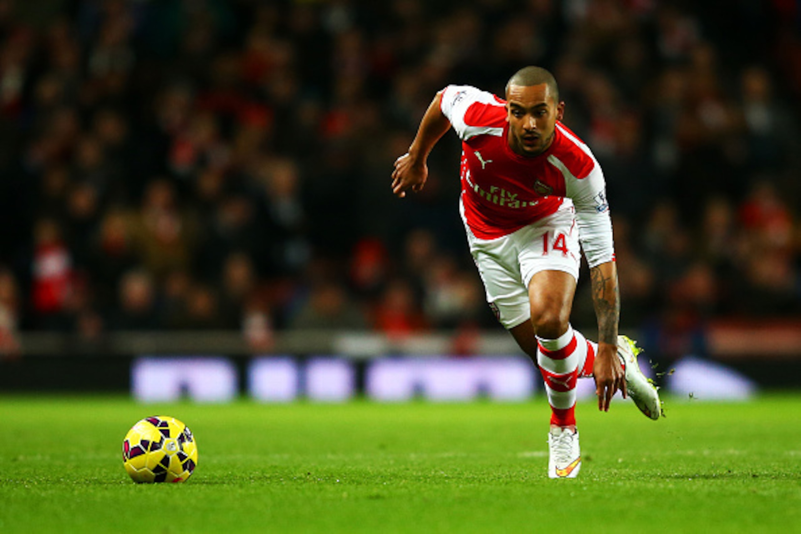 LONDON, ENGLAND - FEBRUARY 10:  Theo Walcott of Arsenal in action during the Barclays Premier League match between Arsenal and Leicester City at Emirates Stadium on February 10, 2015 in London, England.  (Photo by Richard Heathcote/Getty Images)