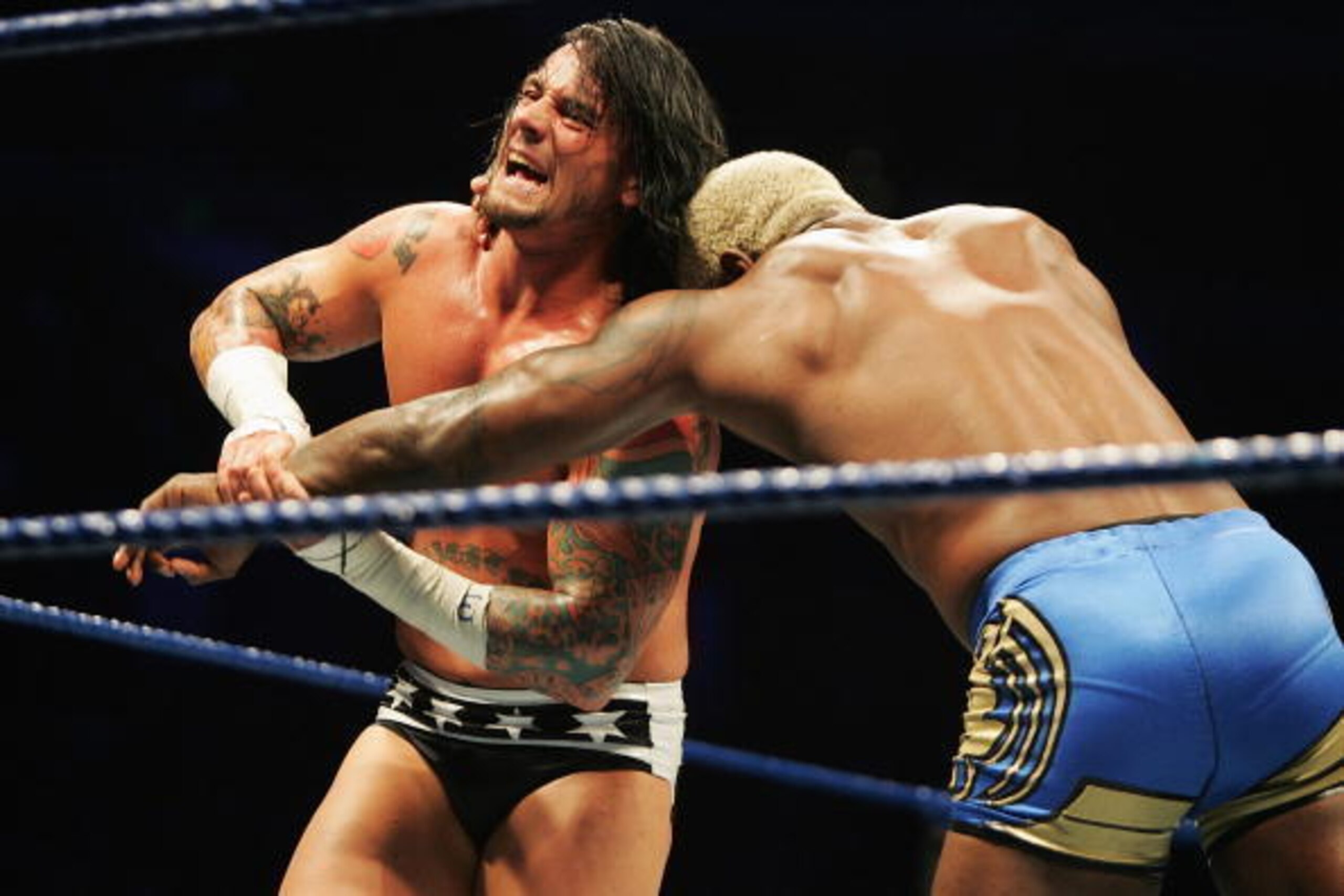 SYDNEY, AUSTRALIA - JUNE 15:  CM Punk wrestles Shelton Benjamin during WWE Smackdown at Acer Arena on June 15, 2008 in Sydney, Australia.  (Photo by Gaye Gerard/Getty Images)