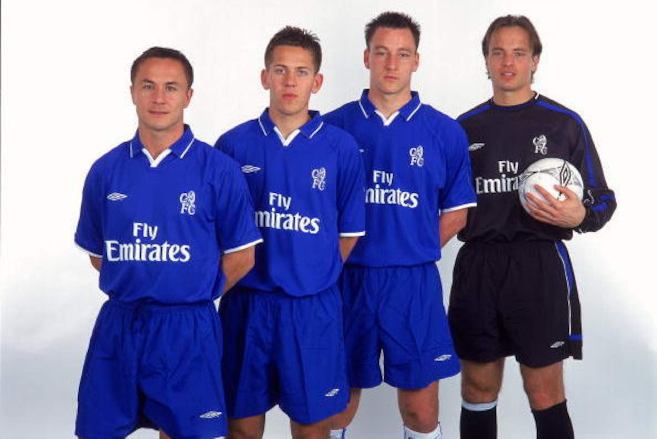 14 Mar 2001:  (from left to right) Chelsea players Dennis Wise, Jon Harley, John Terry, and Mark Bosnich help launch the new Chelsea kit for next season during the Umbro Commission press conference held at Stamford Bridge, in London. \ Mandatory Credit: J