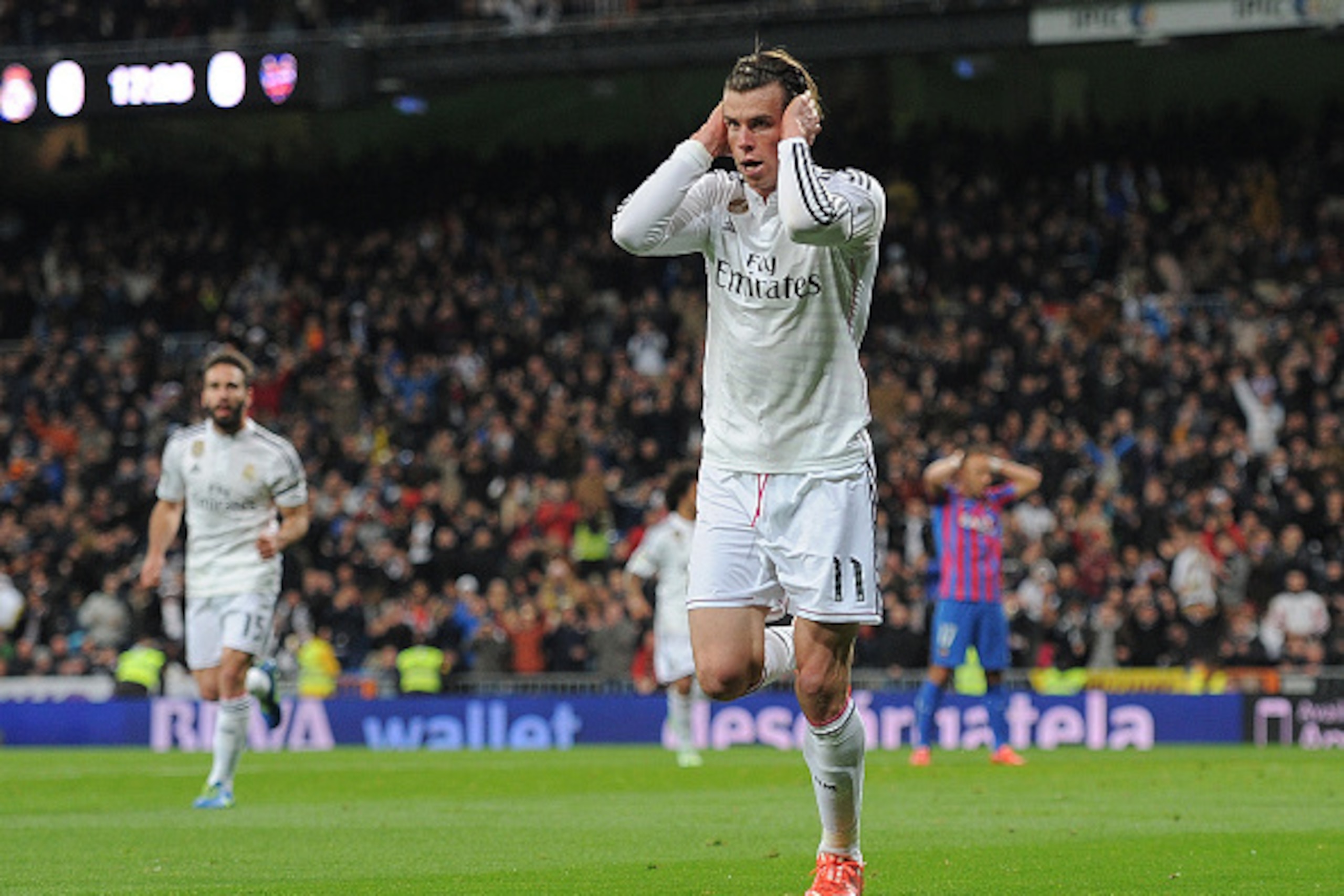 MADRID, SPAIN - MARCH 15: Gareth Bale of Real Madrid celebrates after scoring Real's opening goal during the La Liga match between Real Madrid CF and Levante UD at Estadio Santiago Bernabeu on March 15, 2015 in Madrid, Spain. (Photo by Denis Doyle/Getty MADRID, SPAIN - MARCH 15: Gareth Bale of Real Madrid celebrates after scoring Real's opening goal during the La Liga match between Real Madrid CF and Levante UD at Estadio Santiago Bernabeu on March 15, 2015 in Madrid, Spain. (Photo by Denis Doyle/Getty