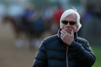 LOUISVILLE, KY - MAY 01:  Bob Baffert, trainer of Kentucky Derby contenders Hoppertunity and Chitu, watches track activity during early morning workouts at Churchill Downs on May 1, 2014 in Louisville, Kentucky.  (Photo by Kevin C. Cox/Getty Images)