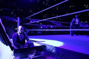 Undertaker emerges from a casket.