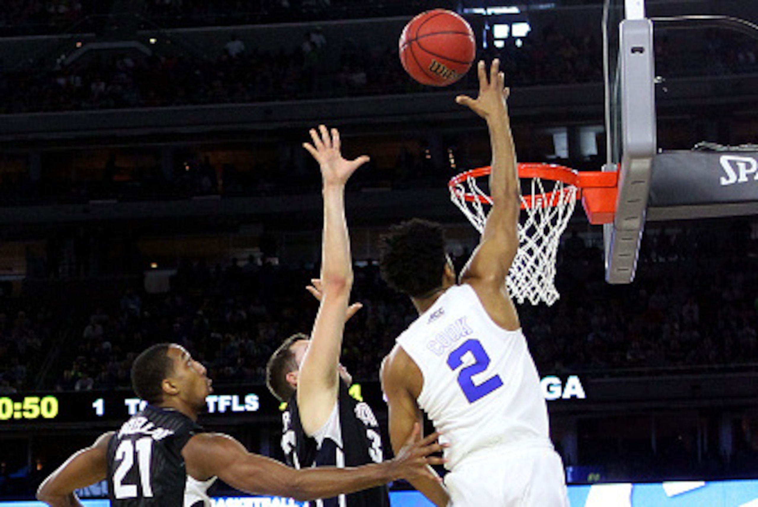 HOUSTON, TX - MARCH 29: Quinn Cook #2 of the Duke Blue Devils goes to the basket against the Gonzaga Bulldogs during the South Regional Final of the 2015 NCAA Men's Basketball Tournament at NRG Stadium on March 29, 2015 in Houston, Texas. (Photo by Ronal HOUSTON, TX - MARCH 29: Quinn Cook #2 of the Duke Blue Devils goes to the basket against the Gonzaga Bulldogs during the South Regional Final of the 2015 NCAA Men's Basketball Tournament at NRG Stadium on March 29, 2015 in Houston, Texas. (Photo by Ronal