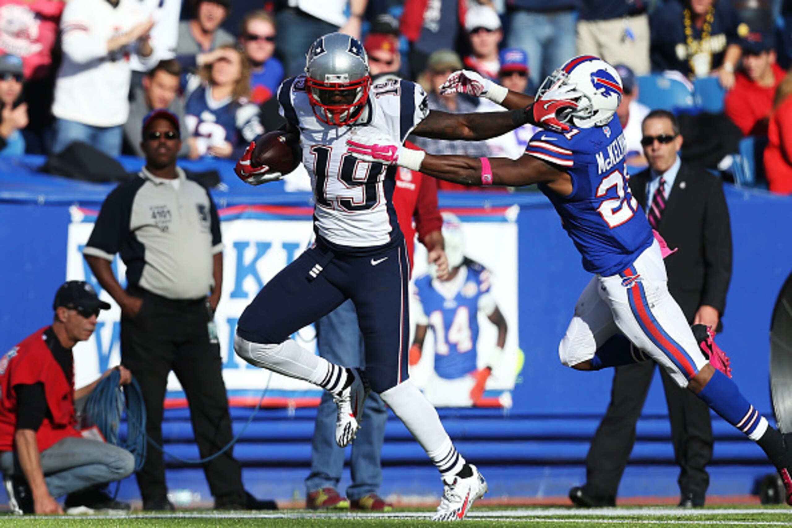 ORCHARD PARK, NY - OCTOBER 12:   Brandon LaFell #19 of the New England Patriots makes a catch in front of Leodis McKelvin #21 of the Buffalo Bills during the second half at Ralph Wilson Stadium on October 12, 2014 in Orchard Park, New York.  (Photo by Bre