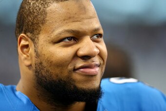 ARLINGTON, TX - JANUARY 04:  Defensive tackle Ndamukong Suh #90 of the Detroit Lions looks on before taking on the Dallas Cowboys during the NFC Wildcard Playoff Game at AT&T Stadium on January 4, 2015 in Arlington, Texas.  (Photo by Ronald Martinez/Getty