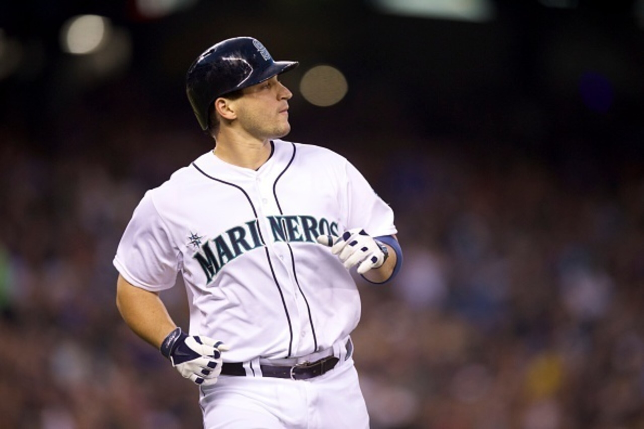 SEATTLE, WA - SEPTEMBER 13: Seattle Mariners Mike Zunino #3 runs to the dugout following an at-bat in a baseball game against the Oakland Athletics at Safeco Field on September 13, 2014 in Seattle, Washington. (Photo by Stephen Brashear/Getty Images)