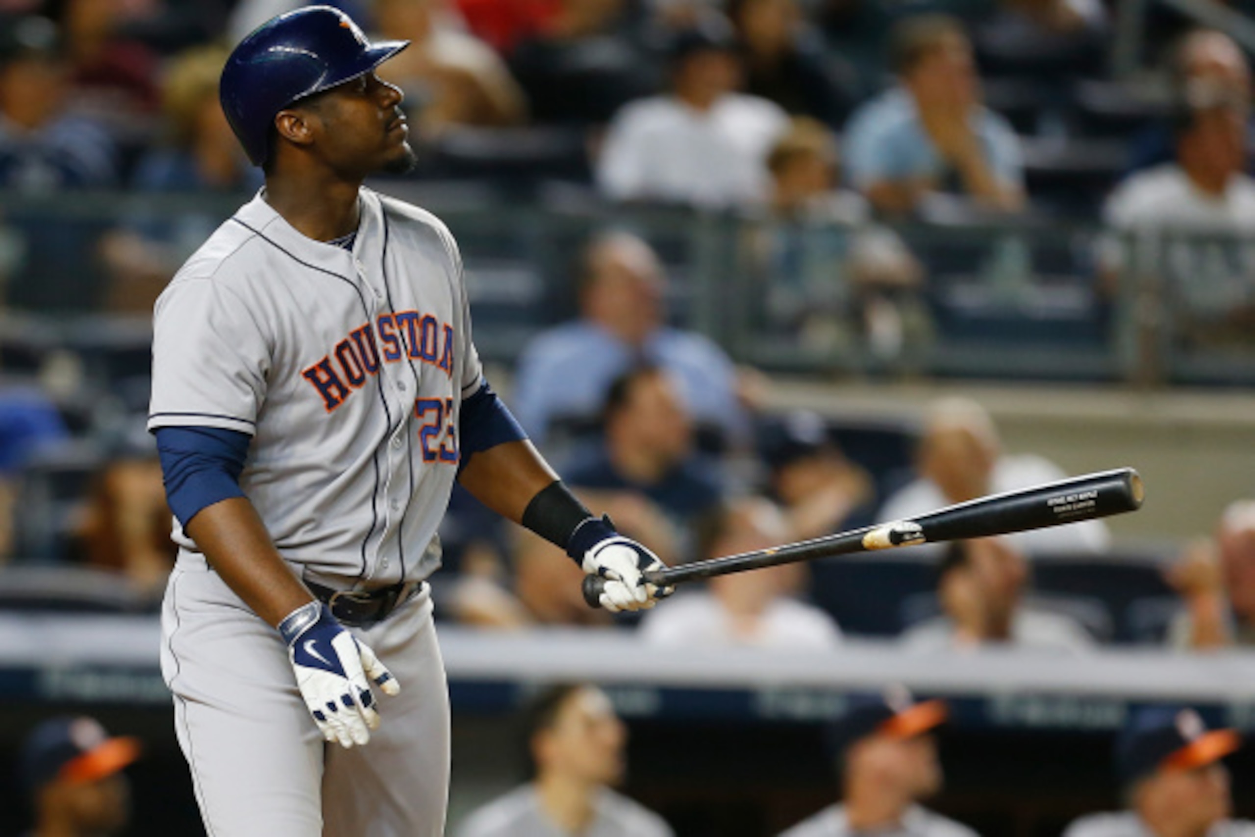 NEW YORK, NY - AUGUST 19:  Chris Carter #23 of the Houston Astros connects on a three run home run in the ninth inning against the New York Yankees at Yankee Stadium on August 19, 2014 in the Bronx borough of New York City.  (Photo by Mike Stobe/Getty Ima