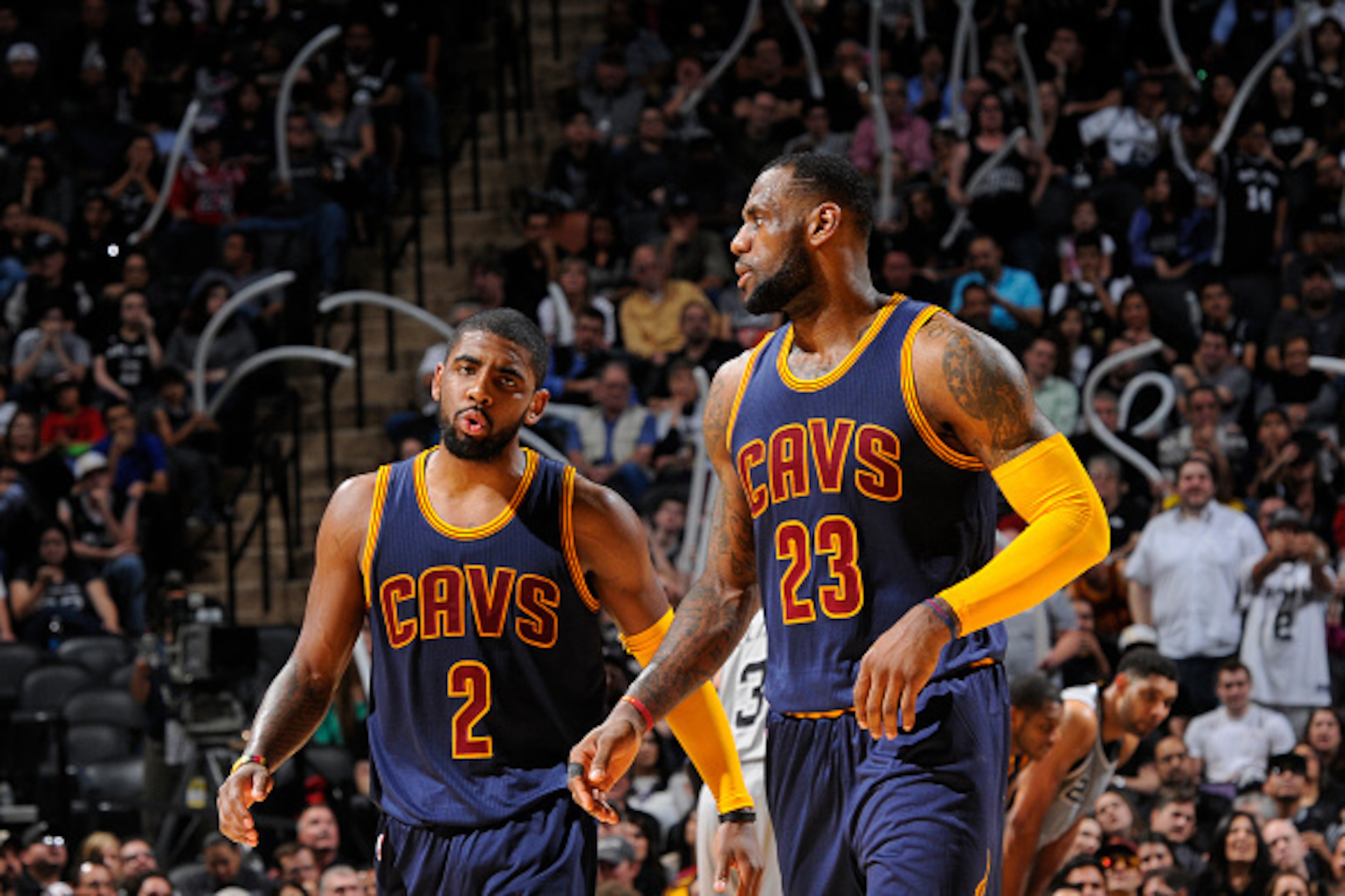 SAN ANTONIO - MARCH 12: Kyrie Irving #2 and LeBron James #23 of the Cleveland Cavaliers stand on the court during a game against the San Antonio Spurs at the AT&T Center on March 12, 2015 in San Antonio, Texas. NOTE TO USER: User expressly acknowledges an SAN ANTONIO - MARCH 12: Kyrie Irving #2 and LeBron James #23 of the Cleveland Cavaliers stand on the court during a game against the San Antonio Spurs at the AT&T Center on March 12, 2015 in San Antonio, Texas. NOTE TO USER: User expressly acknowledges an