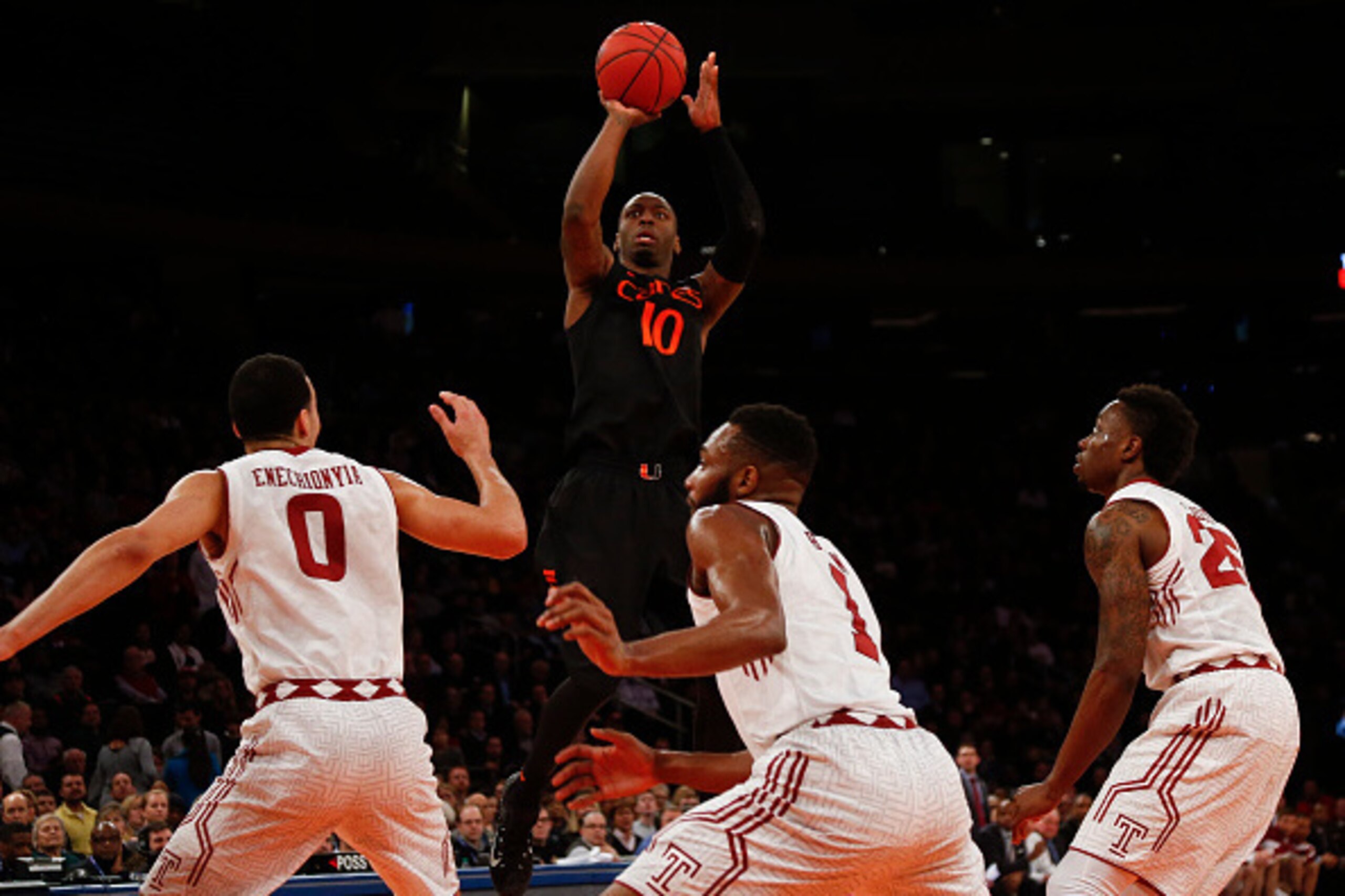 NEW YORK, NY - MARCH 31:   Sheldon McClellan #10 of the Miami (Fl) Hurricanes shoots over the Temple Owls defense during the NIT Championship semifinals at Madison Square Garden on March 31, 2015 in New York City.  (Photo by Jeff Zelevansky/Getty Images)