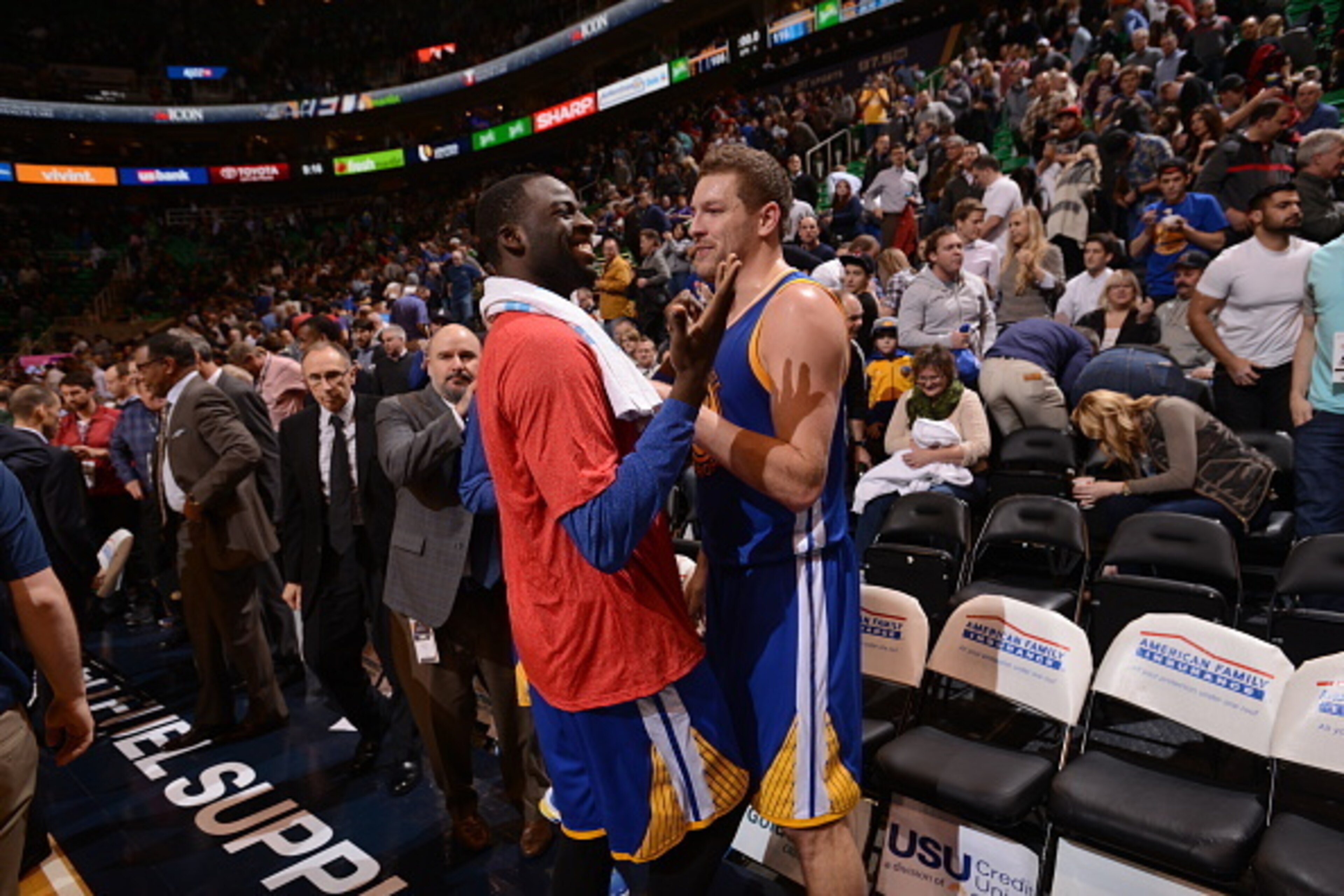 SALT LAKE CITY, UT - JANUARY 13:  Draymond Green #23 and David Lee #10 of the Golden State Warriors talk after the game against the Utah Jazz on January 13, 2015 in Salt Lake City, Utah. NOTE TO USER: User expressly acknowledges and agrees that, by downlo