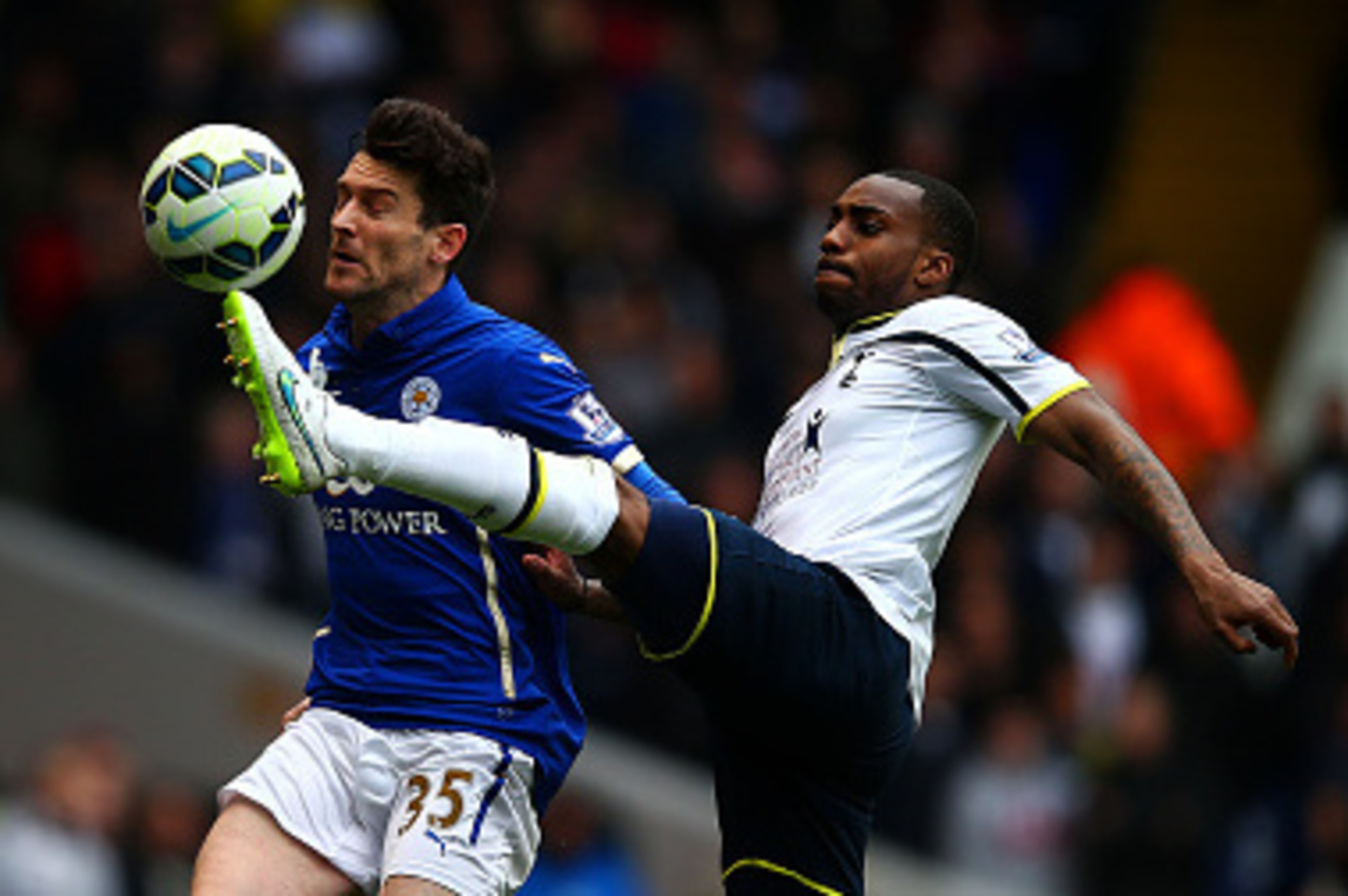 LONDON, ENGLAND - MARCH 21:  David Nugent of Leicester City battles for the ball with Danny Rose of Spurs during the Barclays Premier League match between Tottenham Hotspur and Leicester City at White Hart Lane on March 21, 2015 in London, England.  (Phot