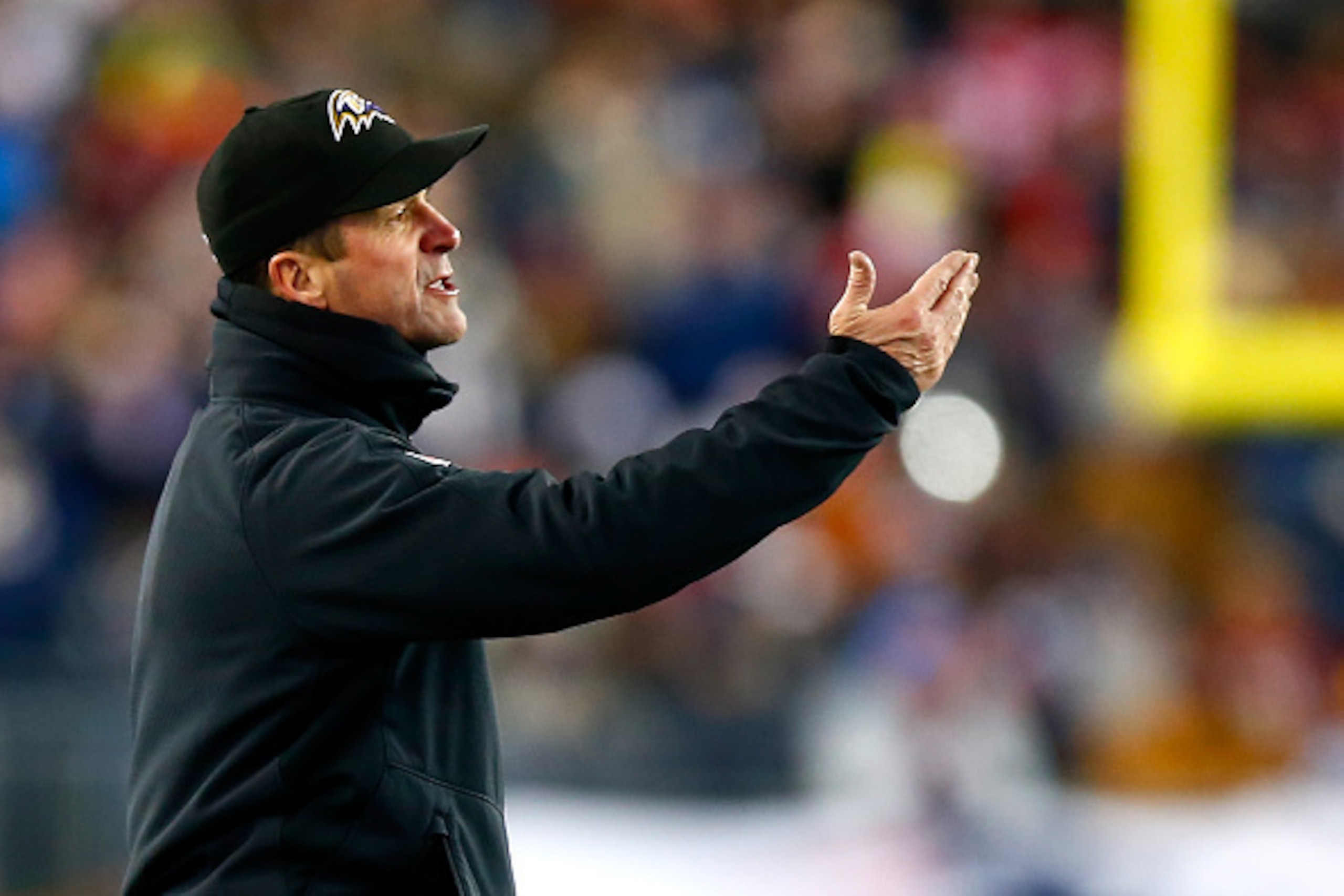 FOXBORO, MA - JANUARY 10: Head coach John Harbaugh of the Baltimore Ravens reacts during the second half of the 2015 AFC Divisional Playoffs game against the New England Patriots at Gillette Stadium on January 10, 2015 in Foxboro, Massachusetts. (Photo FOXBORO, MA - JANUARY 10: Head coach John Harbaugh of the Baltimore Ravens reacts during the second half of the 2015 AFC Divisional Playoffs game against the New England Patriots at Gillette Stadium on January 10, 2015 in Foxboro, Massachusetts. (Photo