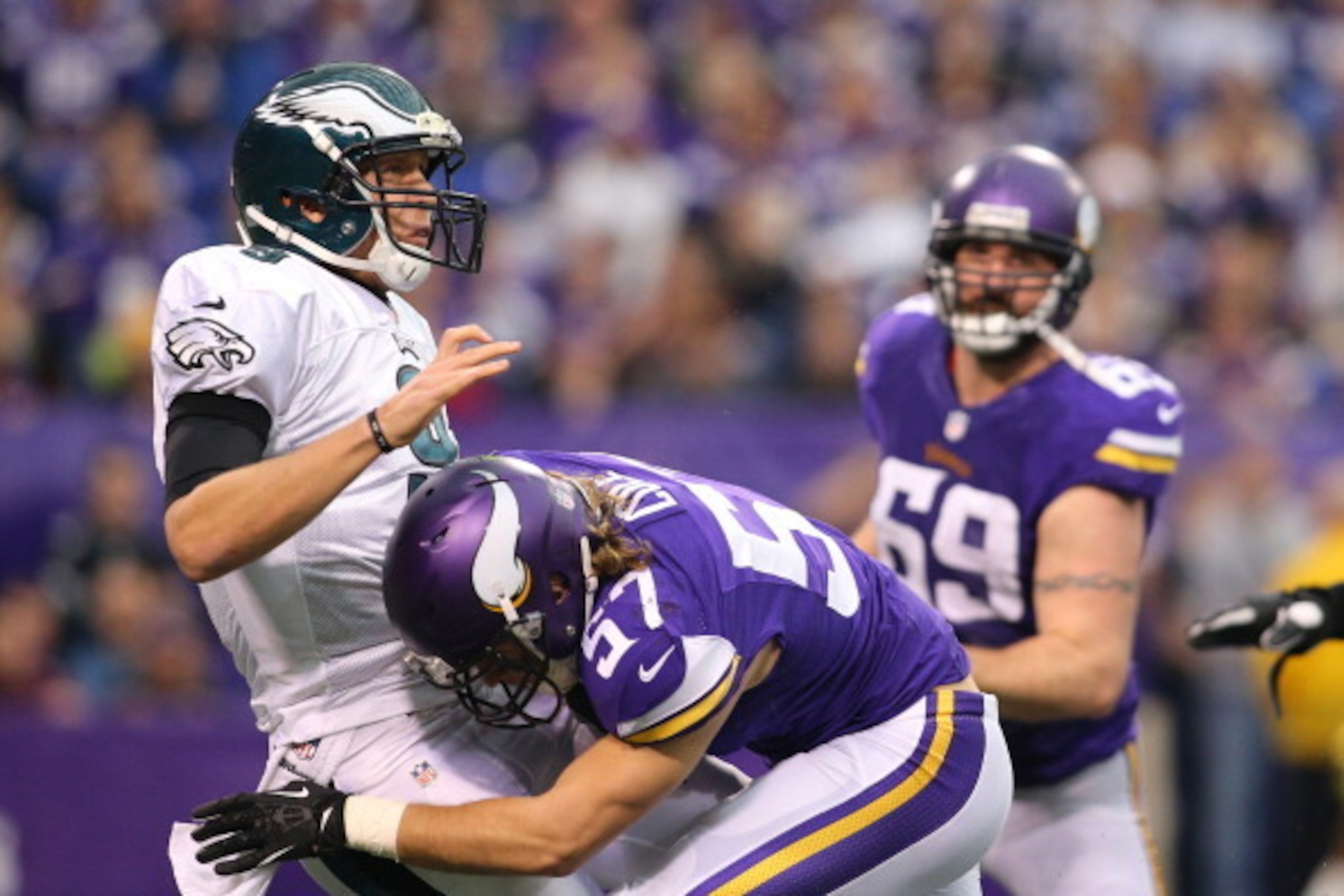MINNEAPOLIS, MN - DECEMBER 15: Nick Foles #9 of the Philadelphia Eagles passes the ball while Audie Cole #57 of the Minnesota Vikings applies pressure on December 15, 2013 at Mall of America Field at the Hubert H. Humphrey Metrodome in Minneapolis, Minne MINNEAPOLIS, MN - DECEMBER 15: Nick Foles #9 of the Philadelphia Eagles passes the ball while Audie Cole #57 of the Minnesota Vikings applies pressure on December 15, 2013 at Mall of America Field at the Hubert H. Humphrey Metrodome in Minneapolis, Minne