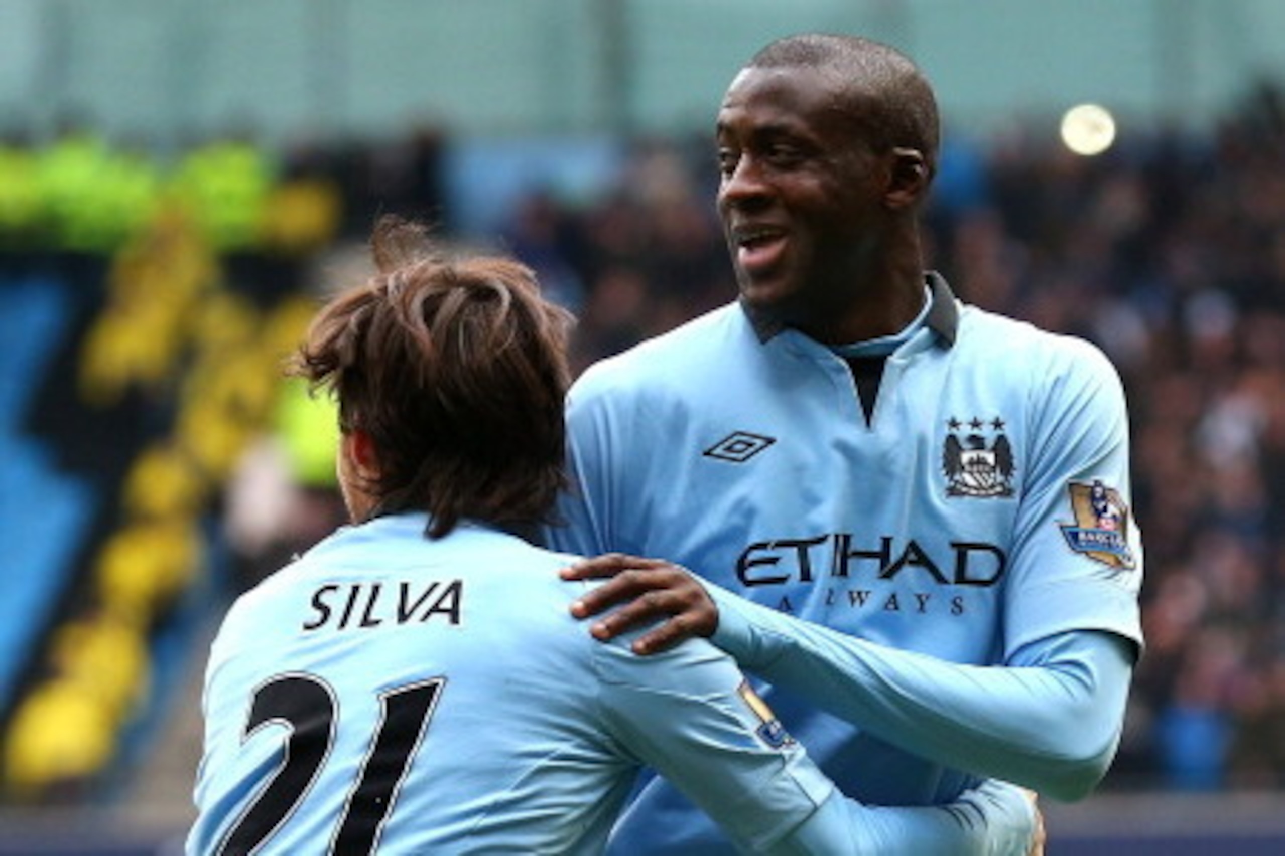 MANCHESTER, ENGLAND - FEBRUARY 24:  Yaya Toure of Manchester City celebrates with David Silva after scoring the opening goal during the Barclays Premier League match between Manchester City and Chelsea at Etihad Stadium on February 24, 2013 in Manchester,