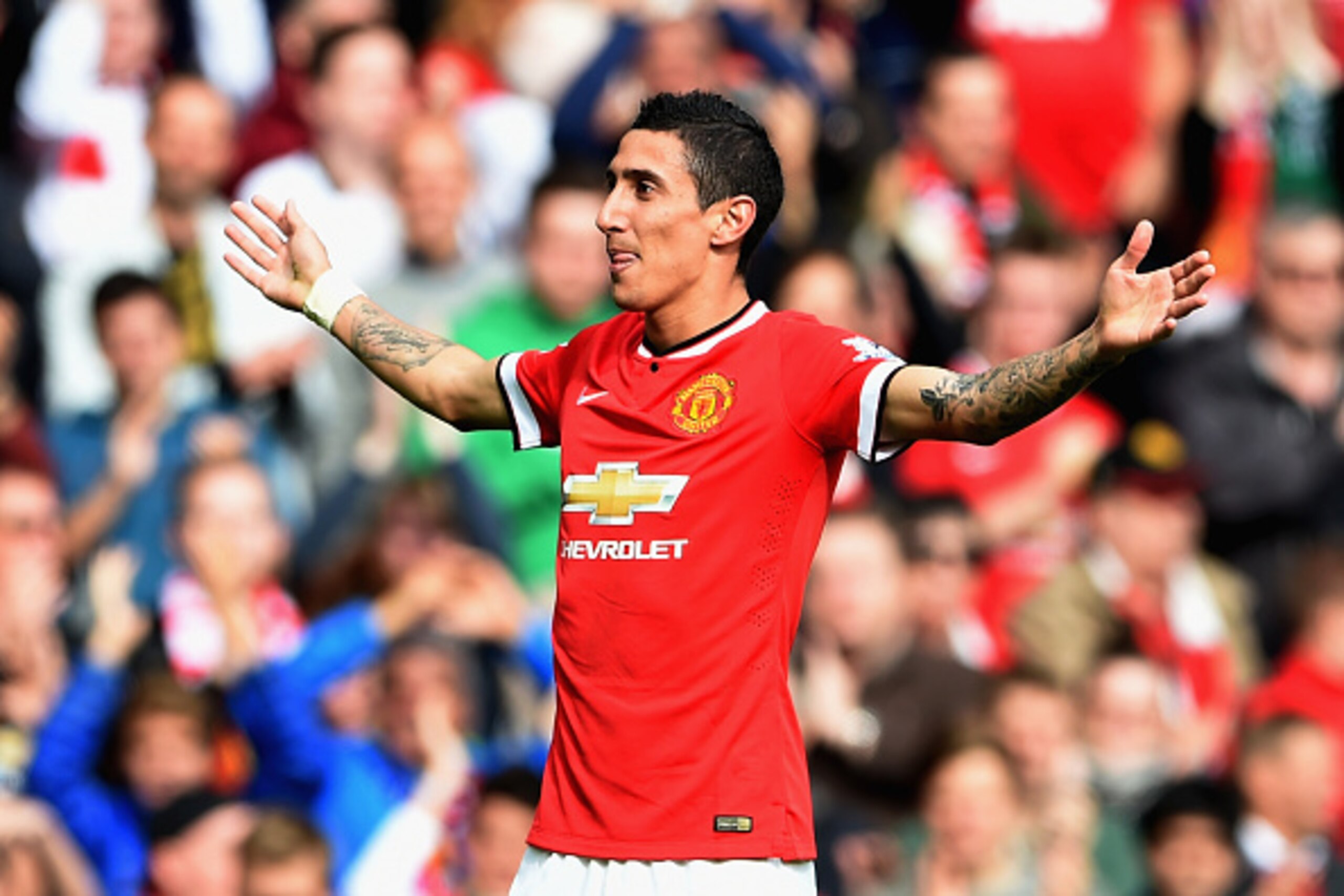 MANCHESTER, ENGLAND - OCTOBER 05: Angel Di Maria of Manchester United celebrates scoring the first goal during the Barclays Premier League match between Manchester United and Everton at Old Trafford on October 5, 2014 in Manchester, England. (Photo by M MANCHESTER, ENGLAND - OCTOBER 05: Angel Di Maria of Manchester United celebrates scoring the first goal during the Barclays Premier League match between Manchester United and Everton at Old Trafford on October 5, 2014 in Manchester, England. (Photo by M