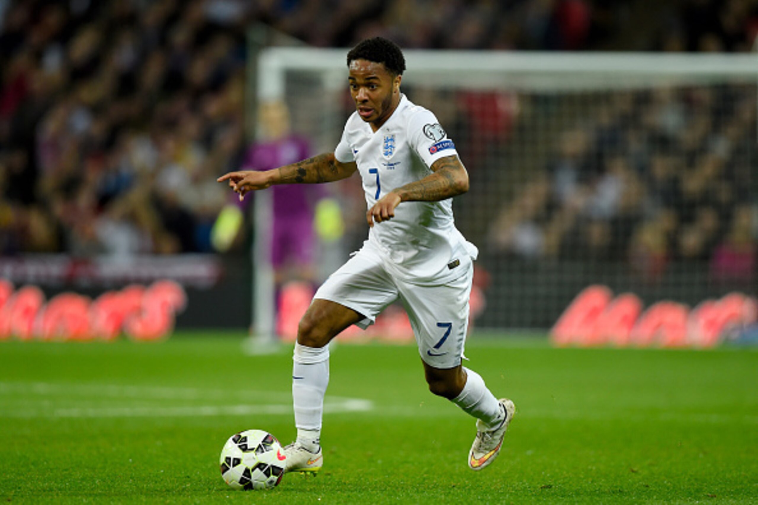 LONDON, ENGLAND - MARCH 27: Raheem Sterling of England runs with the ball during the EURO 2016 Qualifier match between England and Lithuania at Wembley Stadium on March 27, 2015 in London, England. (Photo by Mike Hewitt/Getty Images) LONDON, ENGLAND - MARCH 27: Raheem Sterling of England runs with the ball during the EURO 2016 Qualifier match between England and Lithuania at Wembley Stadium on March 27, 2015 in London, England. (Photo by Mike Hewitt/Getty Images)