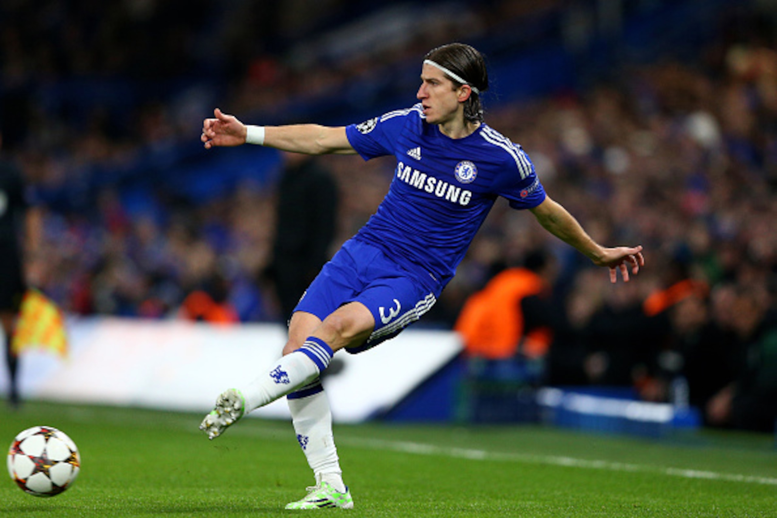 LONDON, ENGLAND - DECEMBER 10:  Filipe Luis of Chelsea passes the ball during the UEFA Champions League group G match between Chelsea and Sporting Clube de Portugal at Stamford Bridge on December 10, 2014 in London, United Kingdom.  (Photo by Clive Mason/
