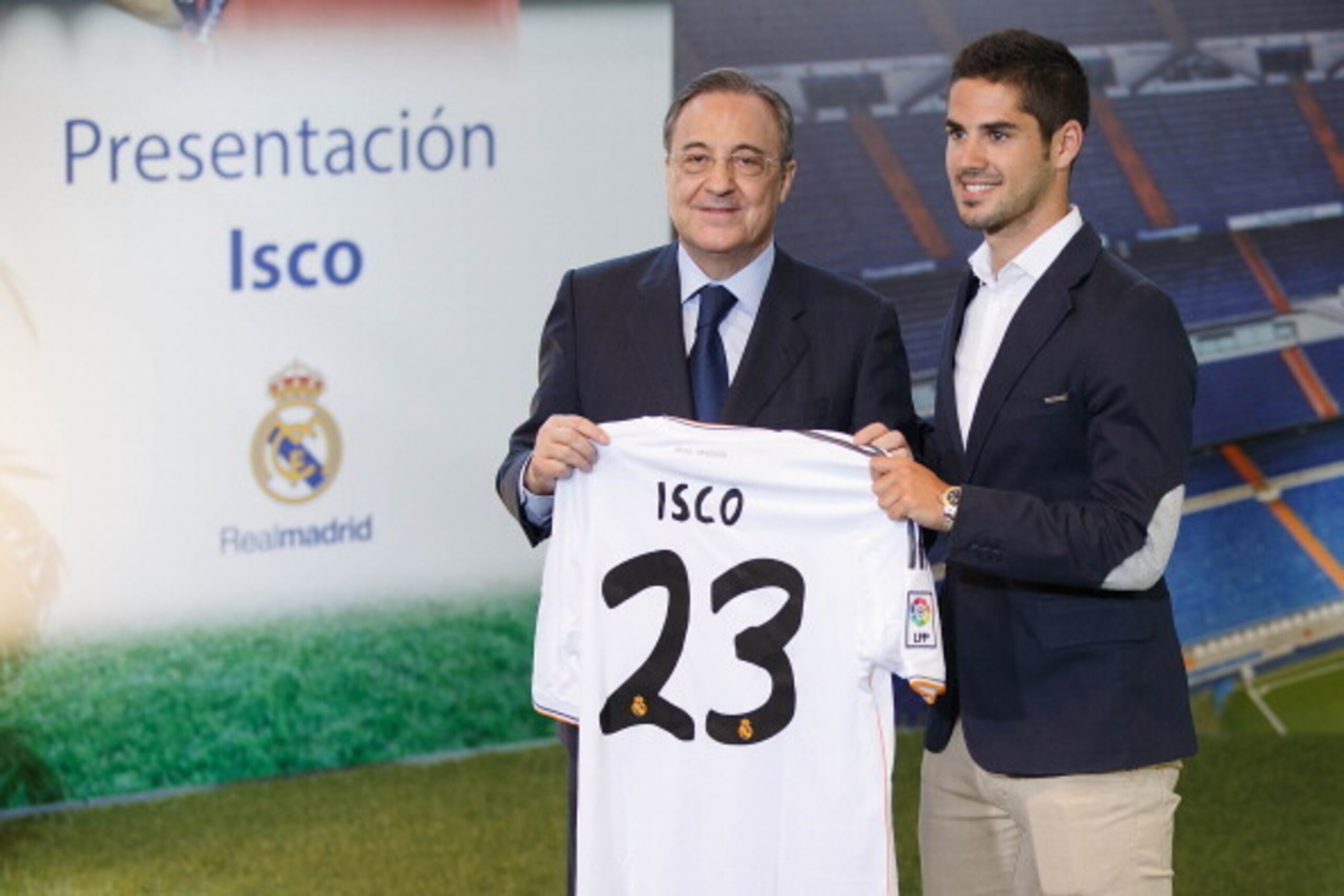 MADRID, SPAIN - JULY 03: Francisco Roman Alarcon alias Isco (R) holds up his Real Madrid shirt as he stands alongside president Florentino Perez (L) during his presentation as a new Real Madrid player at Estadio Bernabeu on July 3, 2013 in Madrid, Spain MADRID, SPAIN - JULY 03: Francisco Roman Alarcon alias Isco (R) holds up his Real Madrid shirt as he stands alongside president Florentino Perez (L) during his presentation as a new Real Madrid player at Estadio Bernabeu on July 3, 2013 in Madrid, Spain