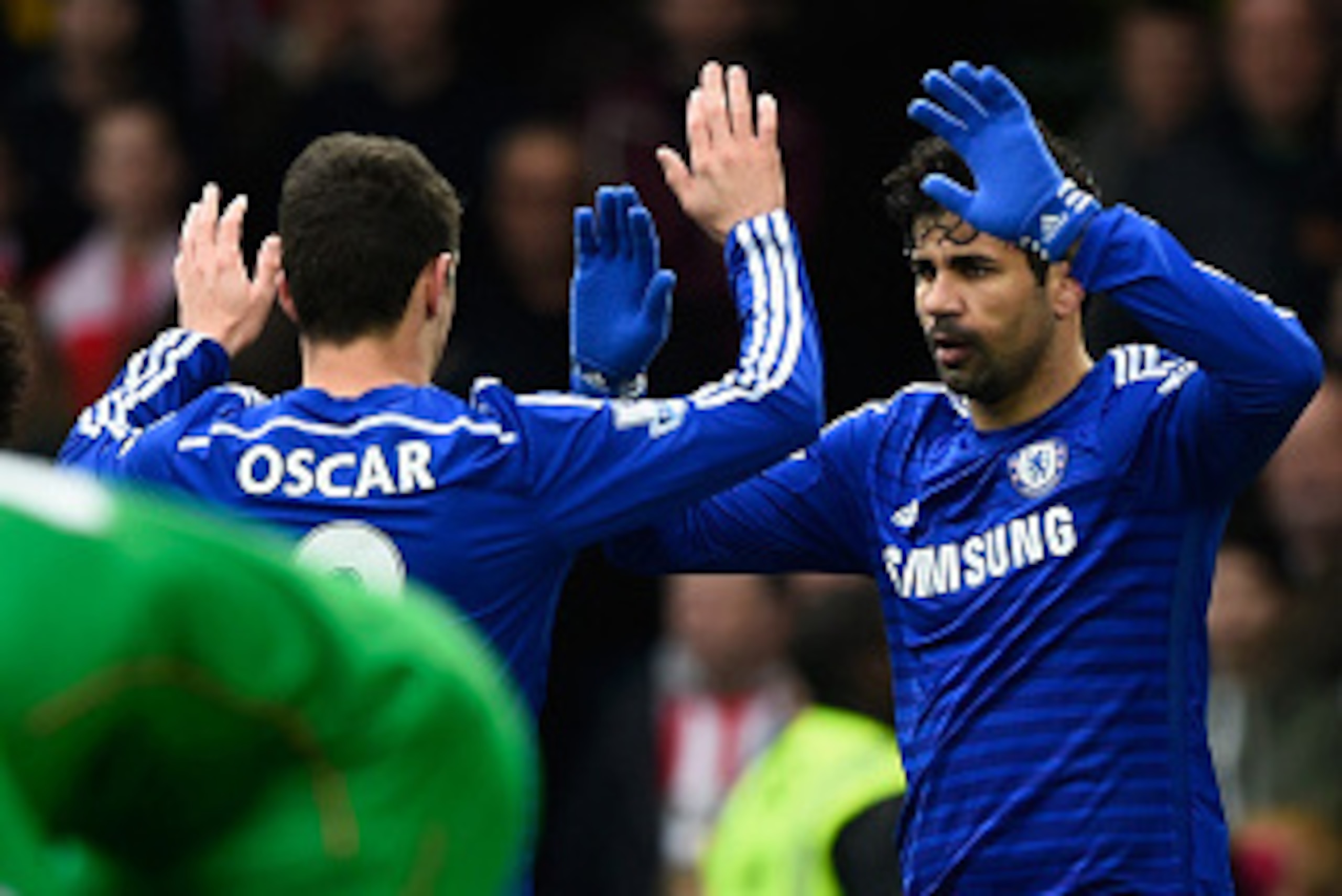 LONDON, ENGLAND - MARCH 15: Diego Costa of Chelsea celebrates scoring the opening goal with Oscar of Chelsea during the Barclays Premier League match between Chelsea and Southampton at Stamford Bridge on March 15, 2015 in London, England. (Photo by Mike LONDON, ENGLAND - MARCH 15: Diego Costa of Chelsea celebrates scoring the opening goal with Oscar of Chelsea during the Barclays Premier League match between Chelsea and Southampton at Stamford Bridge on March 15, 2015 in London, England. (Photo by Mike