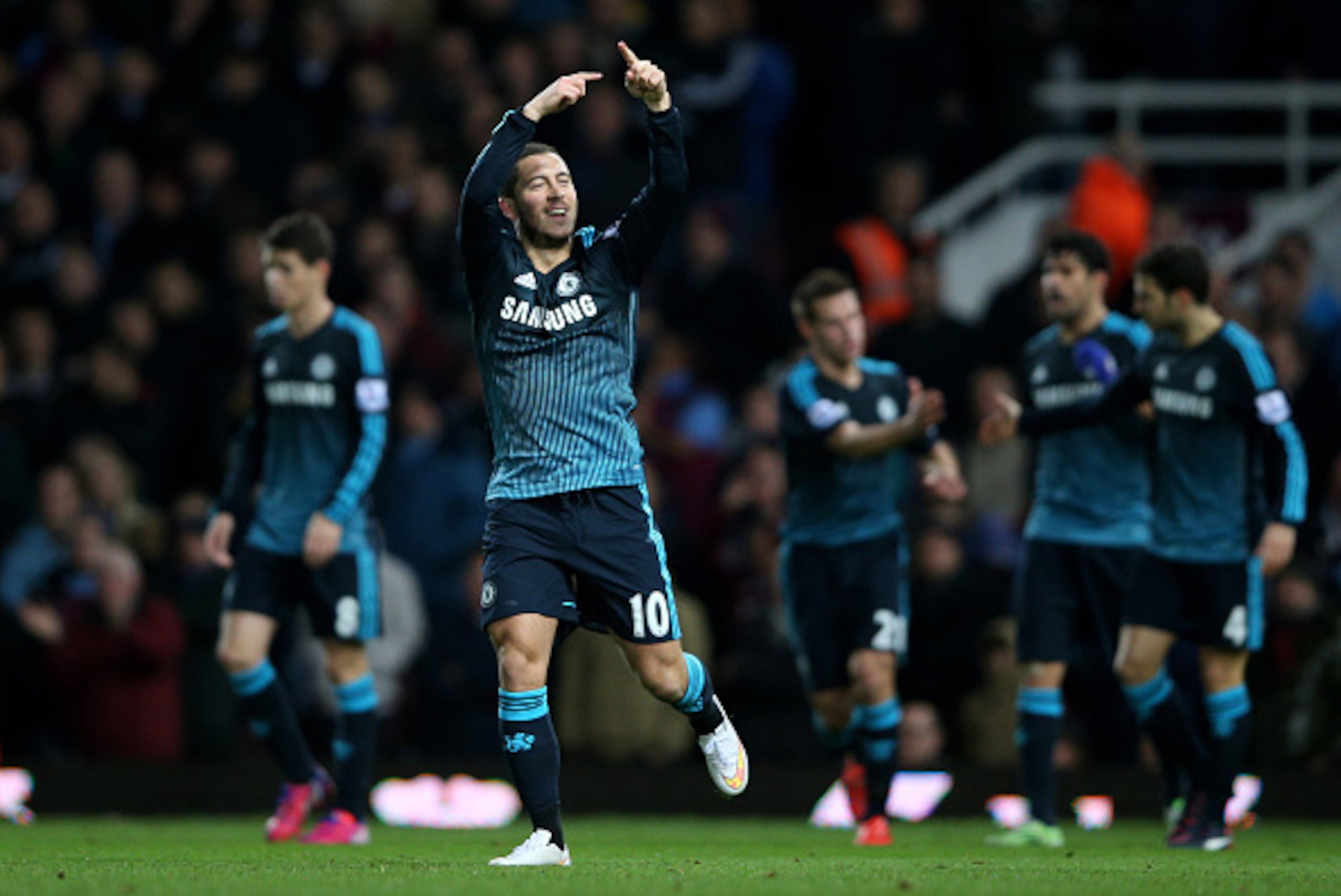 LONDON, ENGLAND - MARCH 04: Eden Hazard of Chelsea celebrates after scoring the opening goal during the Barclays Premier League match between West Ham and Chelsea at the Boleyn Ground on March 4, 2015 in London, England. (Photo by Paul Gilham/Getty Imag LONDON, ENGLAND - MARCH 04: Eden Hazard of Chelsea celebrates after scoring the opening goal during the Barclays Premier League match between West Ham and Chelsea at the Boleyn Ground on March 4, 2015 in London, England. (Photo by Paul Gilham/Getty Imag
