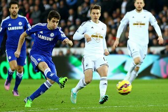 SWANSEA, WALES - JANUARY 17: Oscar of Chelsea scores his team's first goal during the Barclays Premier League match between Swansea City and Chelsea at Liberty Stadium on January 17, 2015 in Swansea, Wales. (Photo by Richard Heathcote/Getty Images) SWANSEA, WALES - JANUARY 17: Oscar of Chelsea scores his team's first goal during the Barclays Premier League match between Swansea City and Chelsea at Liberty Stadium on January 17, 2015 in Swansea, Wales. (Photo by Richard Heathcote/Getty Images)