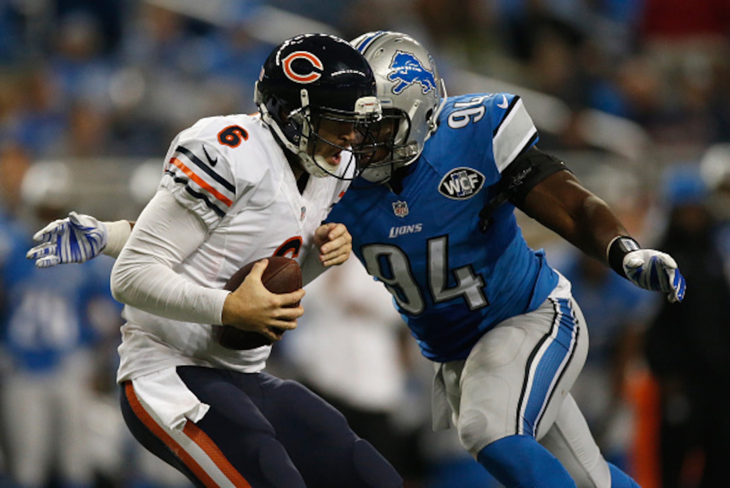 DETROIT, MI - NOVEMBER 27: Ezekiel Ansah #94 of the Detroit Lions sacks Jay Cutler #6 of the Chicago Bears in the fourth quarter at Ford Field on November 27, 2014 in Detroit, Michigan. The Detroit Lions win 34-17. (Photo by Gregory Shamus/Getty Images)