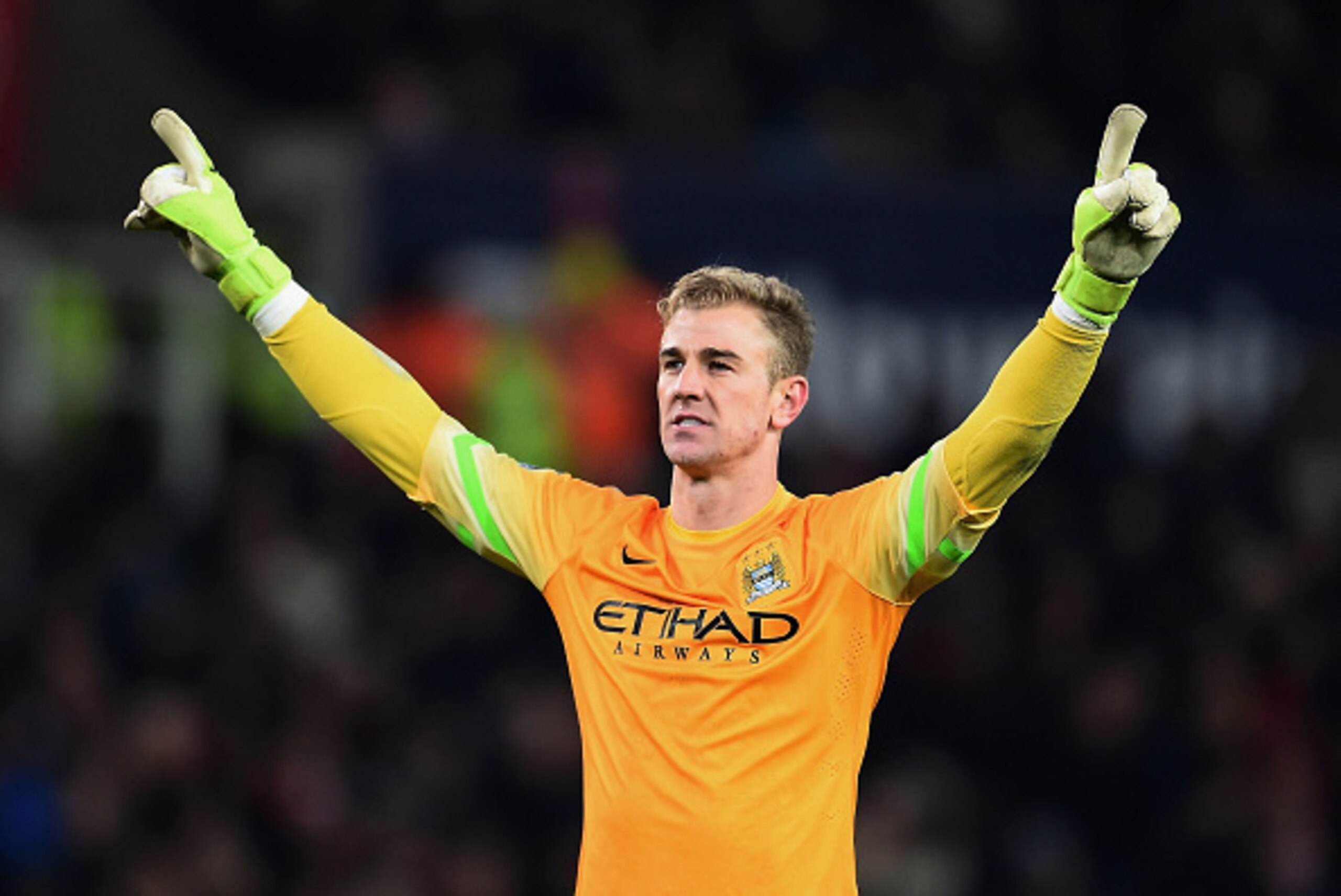 STOKE ON TRENT, ENGLAND - FEBRUARY 11:  Joe Hart of Manchester City celebrates after a team-mate scored a goal during the Barclays Premier League match between Stoke City and Manchester City at Britannia Stadium on February 11, 2015 in Stoke on Trent, Eng