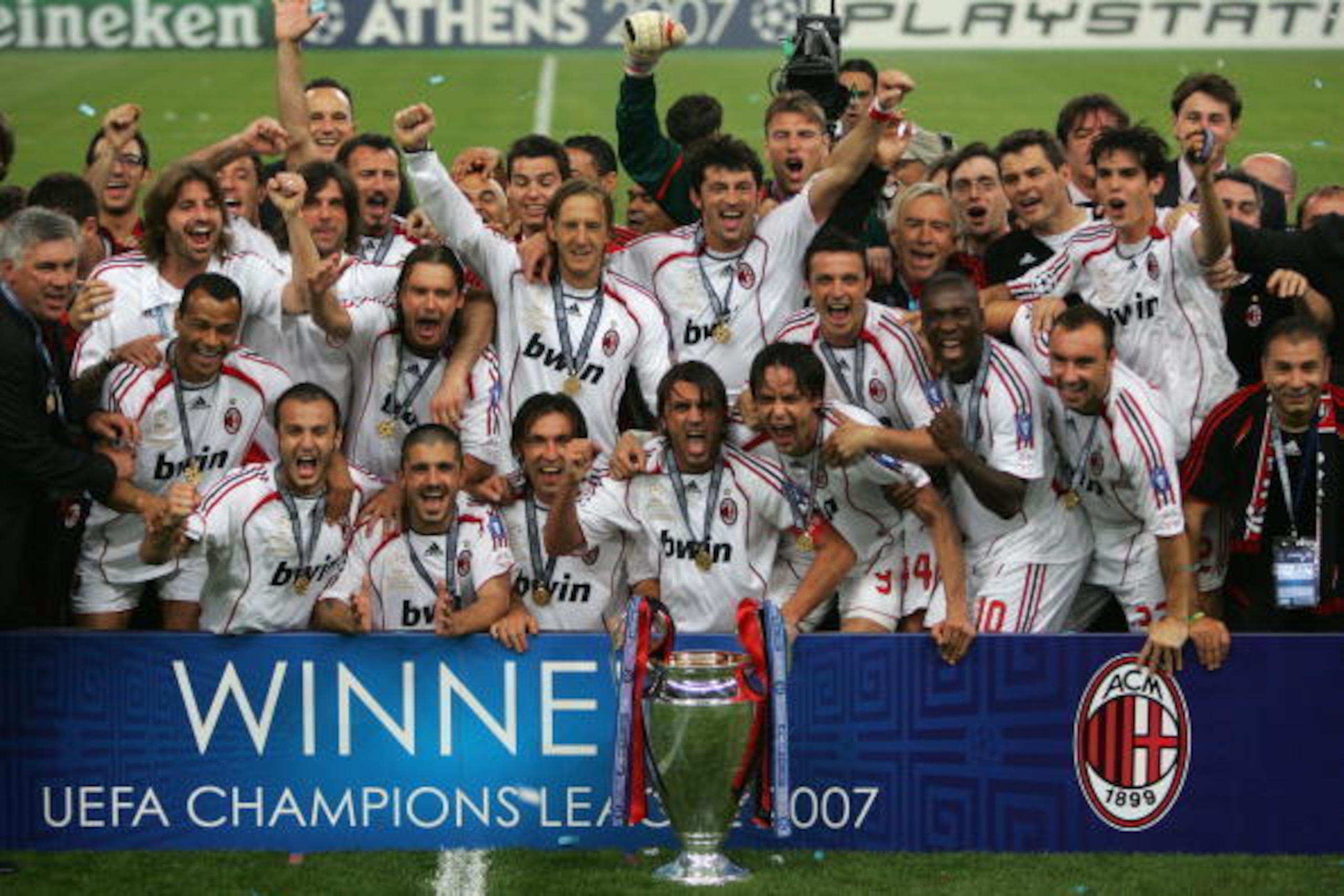 ATHENS, GREECE - MAY 23:  Milan players celebrate with the trophy following their 2-1 victory during the UEFA Champions League Final match between Liverpool and AC Milan at the Olympic Stadium on May 23, 2007 in Athens, Greece.  (Photo by Jamie McDonald/G