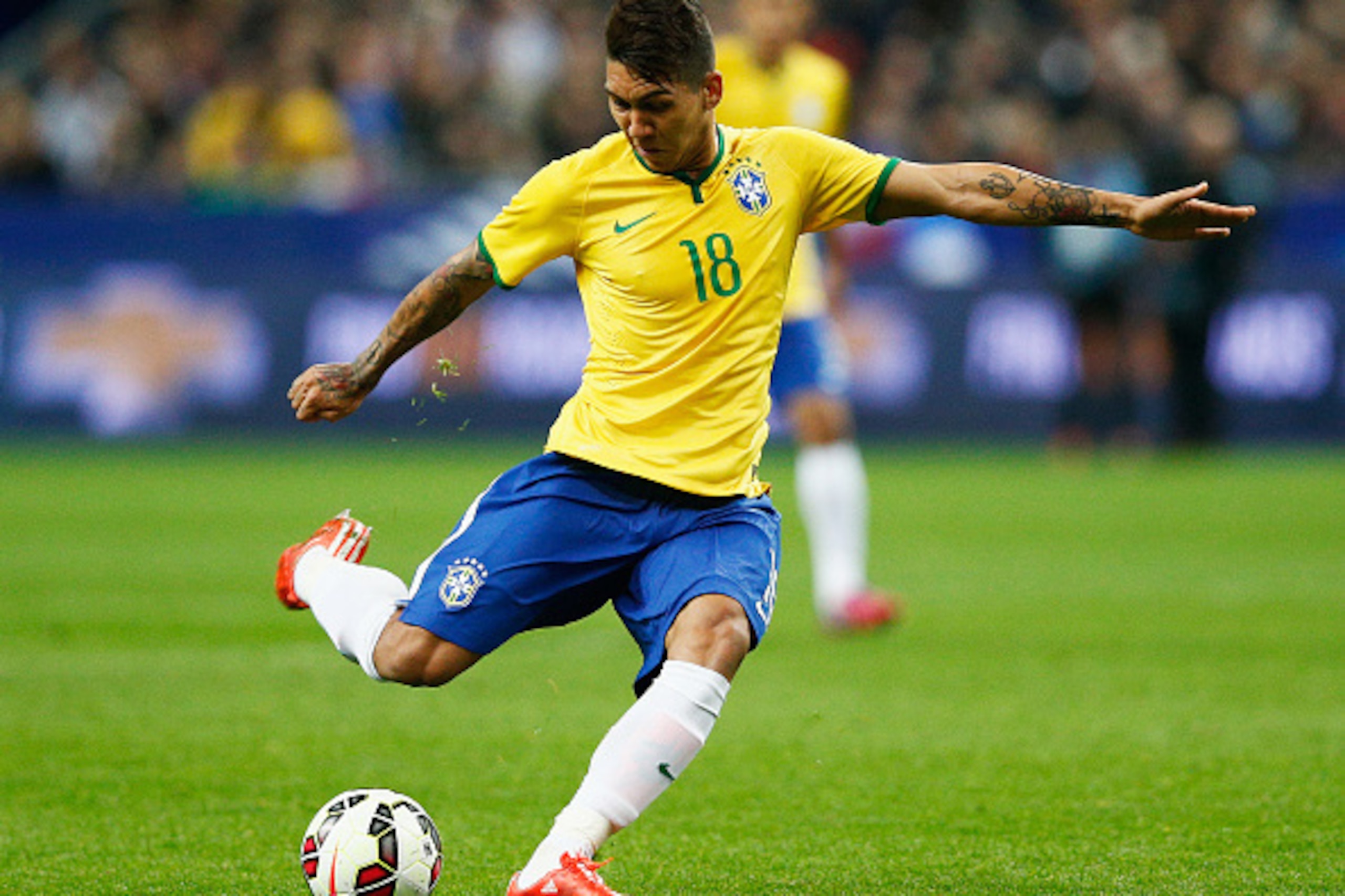 PARIS, FRANCE - MARCH 26:  Roberto Firmino of Brazil in action during the International Friendly match between France and Brazil at the Stade de France on March 26, 2015 in Paris, France.  (Photo by Dean Mouhtaropoulos/Getty Images)