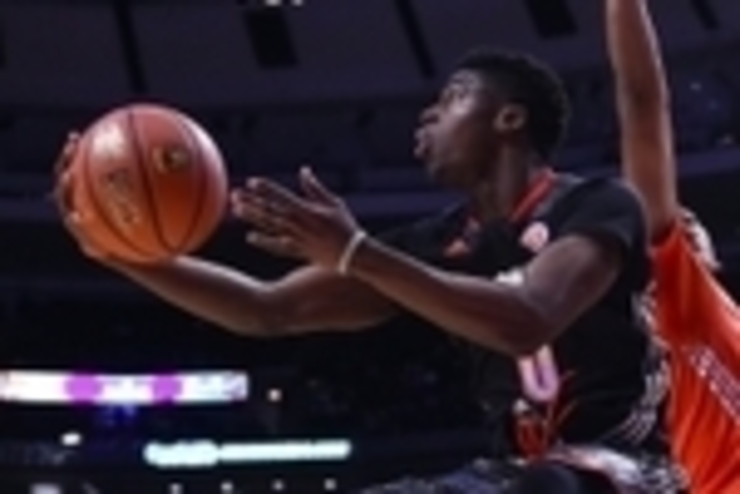 Apr 2, 2014; Chicago, IL, USA; McDonald's All American West guard Emmanuel Mudiay (0) shoots the ball against McDonald's All American East center Myles Turner (35) during the second half at the United Center. The West defeats the East 105-102. Mandatory C