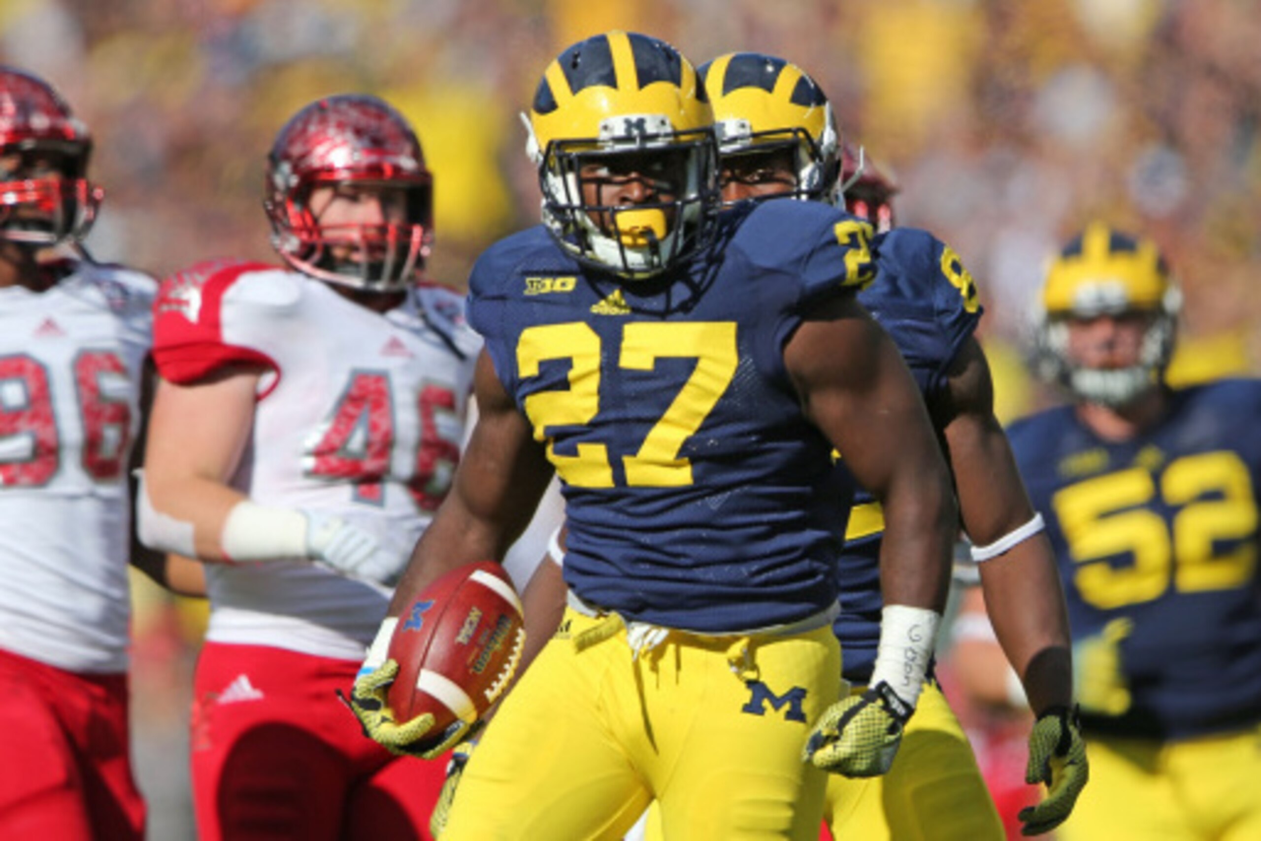 ANN ARBOR, MI - SEPTEMBER 13: Derrick Green #27 of the Michigan Wolverines scores on a one yard run during the first half of the game against Miami University Redhawks at Michigan Stadium on September 13, 2014 in Ann Arbor, Michigan.  (Photo by Leon Halip