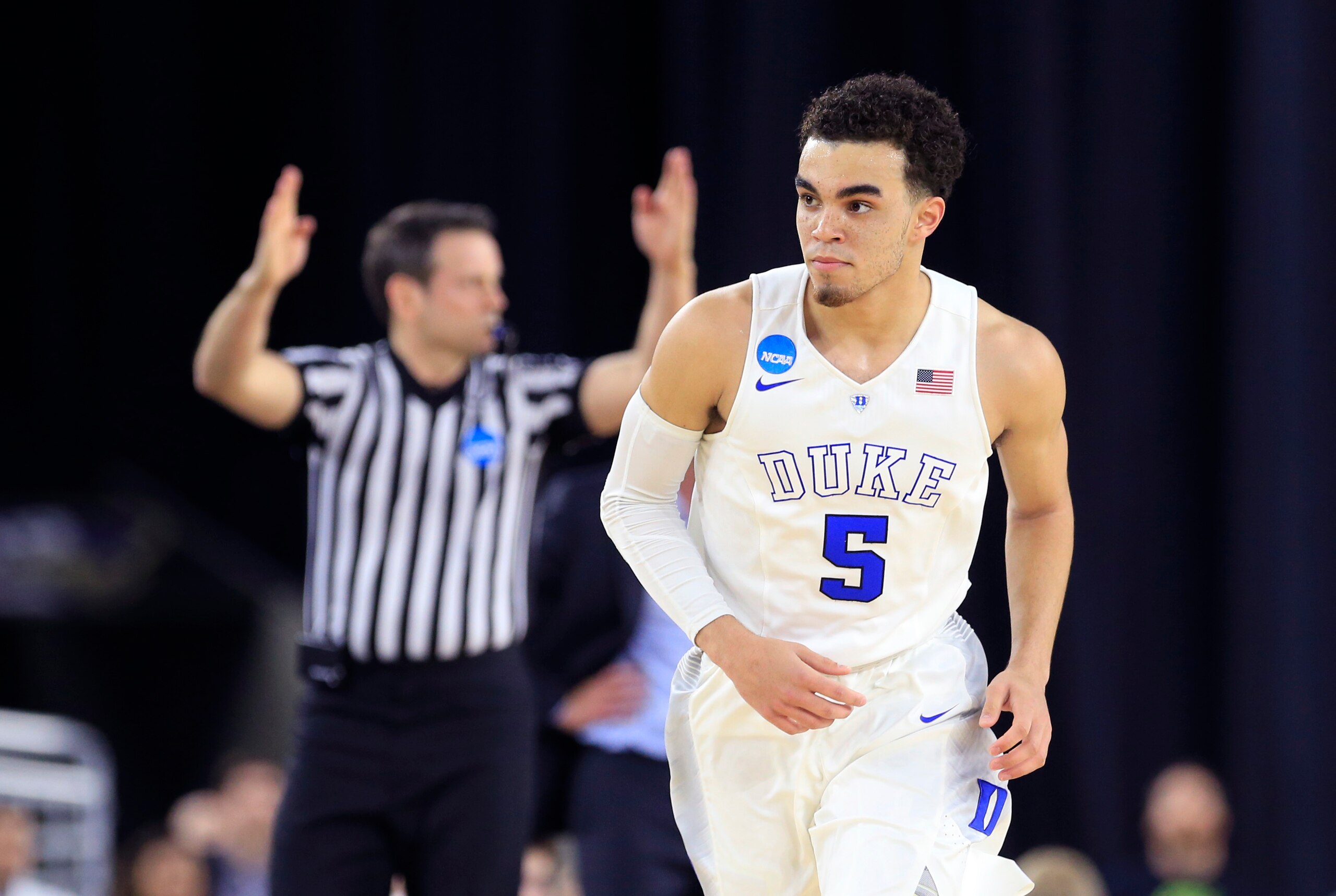 Mar 29, 2015; Houston, TX, USA; Duke Blue Devils guard Tyus Jones (5) reacts after scoring during the game against the Gonzaga Bulldogs in the finals of the south regional of the 2015 NCAA Tournament at NRG Stadium. Mandatory Credit: Kevin Jairaj-USA TODA