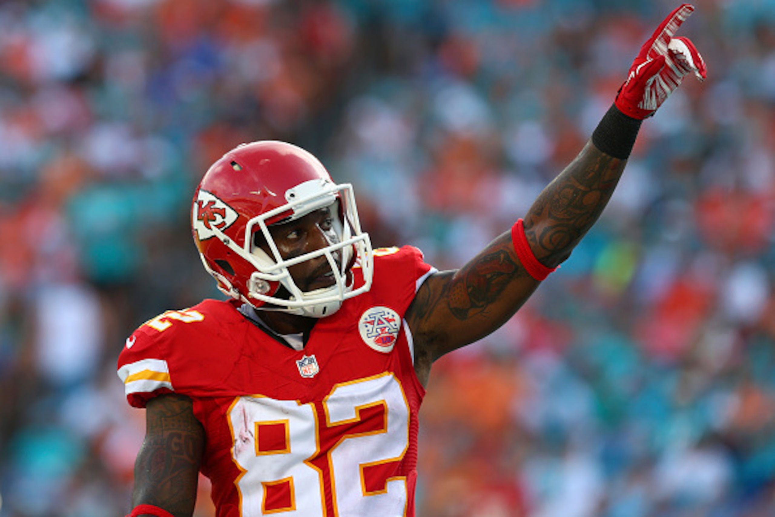 MIAMI GARDENS, FL - SEPTEMBER 21:  Wide receiver Dwayne Bowe #82 of the Kansas City Chiefs celebrates a score in the second quarter against the Miami Dolphins in their game at Sun Life Stadium on September 21, 2014 in Miami Gardens, Florida.  (Photo by Ro