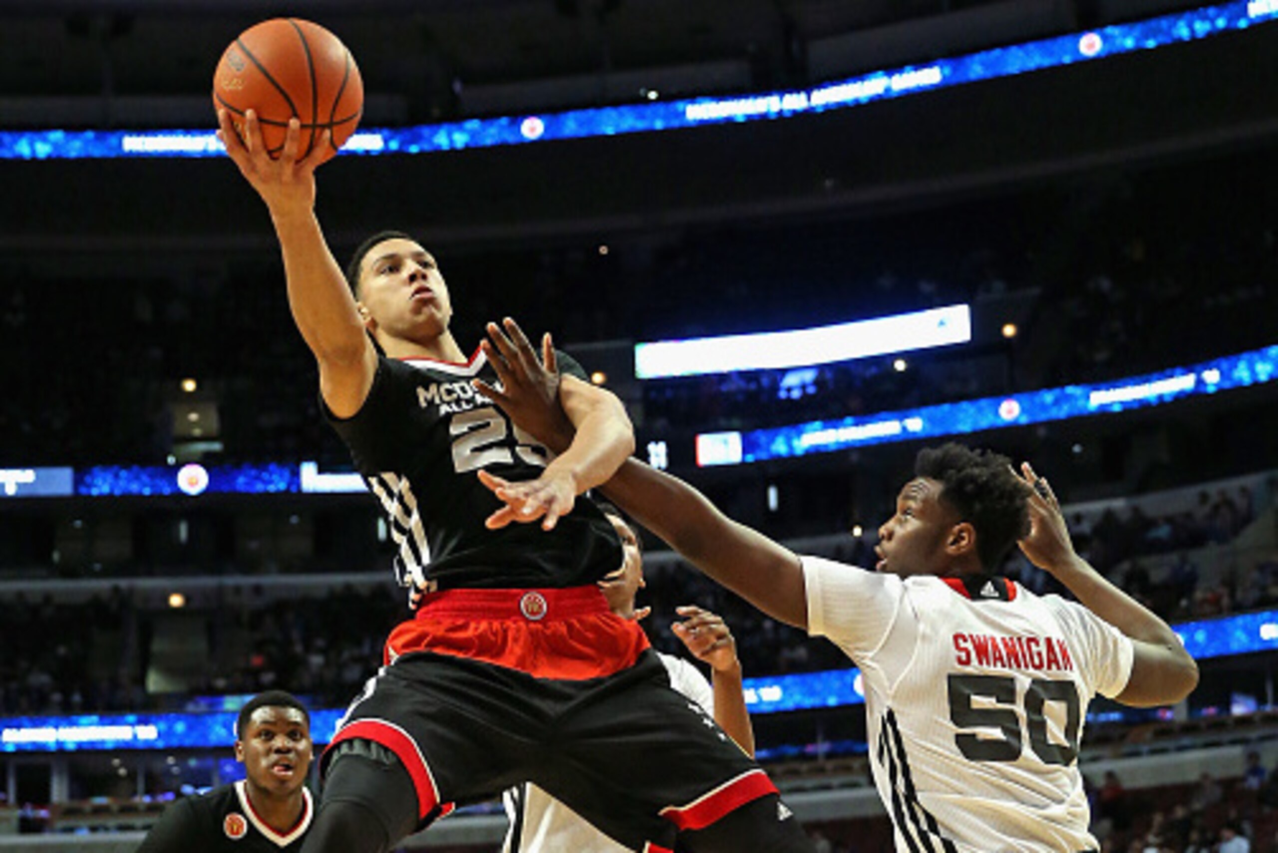 CHICAGO, IL - APRIL 01: Ben Simmons #25 of the East team puts up a shot over Caleb Swanigan #50 of the West team during the 2015 McDonalds's All American Game at the United Center on April 1, 2015 in Chicago, Illinois. The East defeated the West 111-91. (