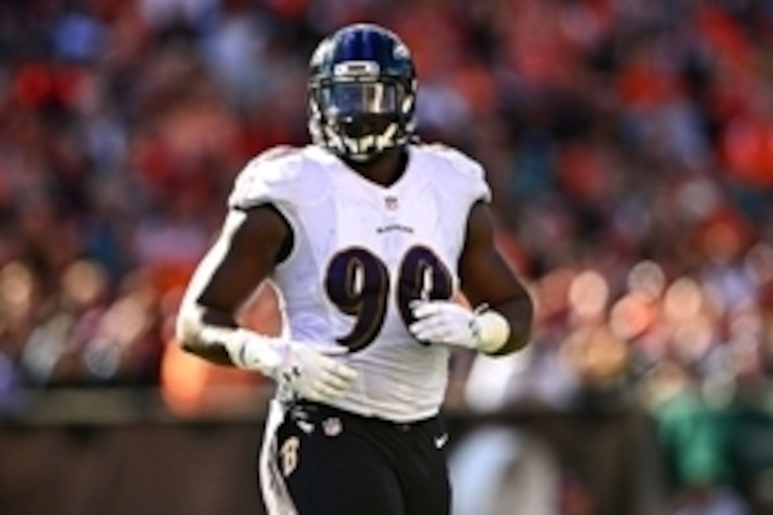 Oct 26, 2014; Cincinnati, OH, USA; 
Baltimore Ravens linebacker Pernell McPhee (90) against the Cincinnati Bengals at Paul Brown Stadium. Bengals defeated the Ravens 27-24. Mandatory Credit: Andrew Weber-USA TODAY Sports