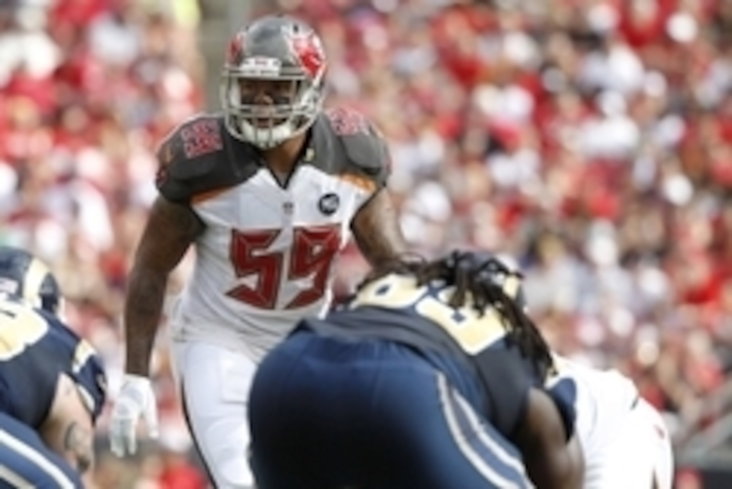 Sep 14, 2014; Tampa, FL, USA;Tampa Bay Buccaneers middle linebacker Mason Foster (59) rushes against the St. Louis Rams during the first half at Raymond James Stadium. Mandatory Credit: Kim Klement-USA TODAY Sports