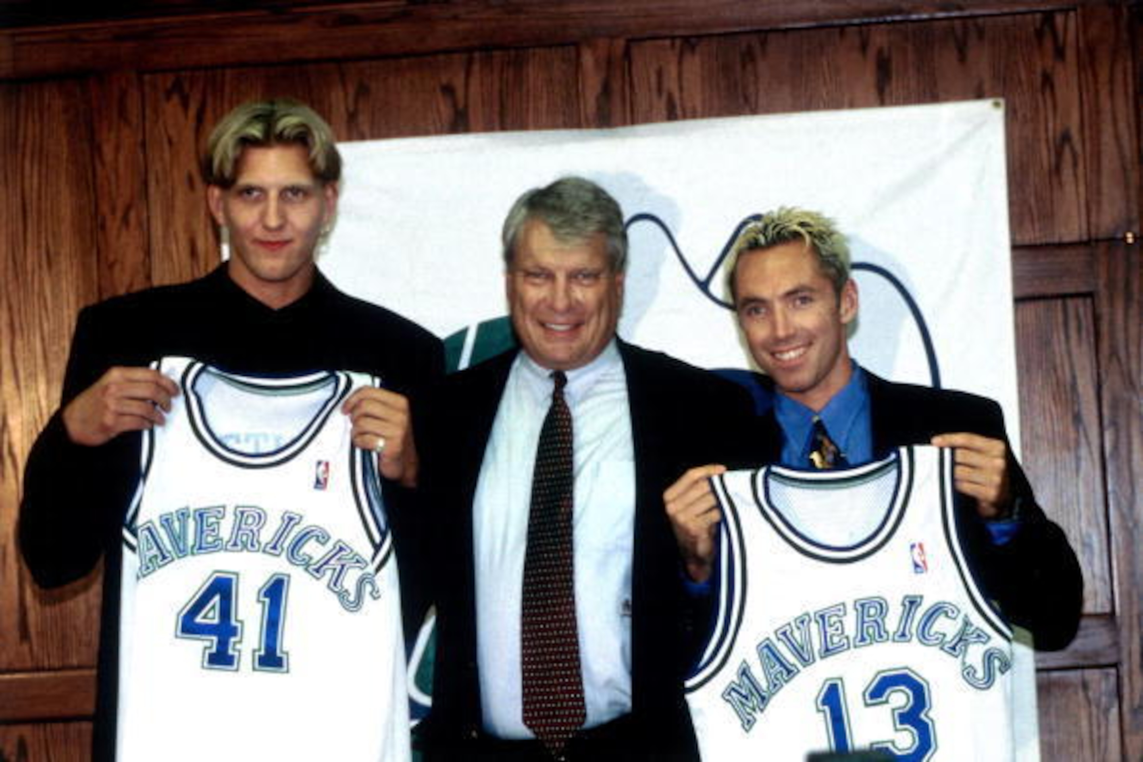 DALLAS - JUNE 29: Dirk Nowitzki #41, head coach Don Nelson and Steve Nash #13 pose for a photo as they are introduced to the Dallas Mavericks during a press conference on June 29, 1998 at Reunion Arena in Dallas, Texas. NOTE TO USER: User expressly ackno DALLAS - JUNE 29: Dirk Nowitzki #41, head coach Don Nelson and Steve Nash #13 pose for a photo as they are introduced to the Dallas Mavericks during a press conference on June 29, 1998 at Reunion Arena in Dallas, Texas. NOTE TO USER: User expressly ackno