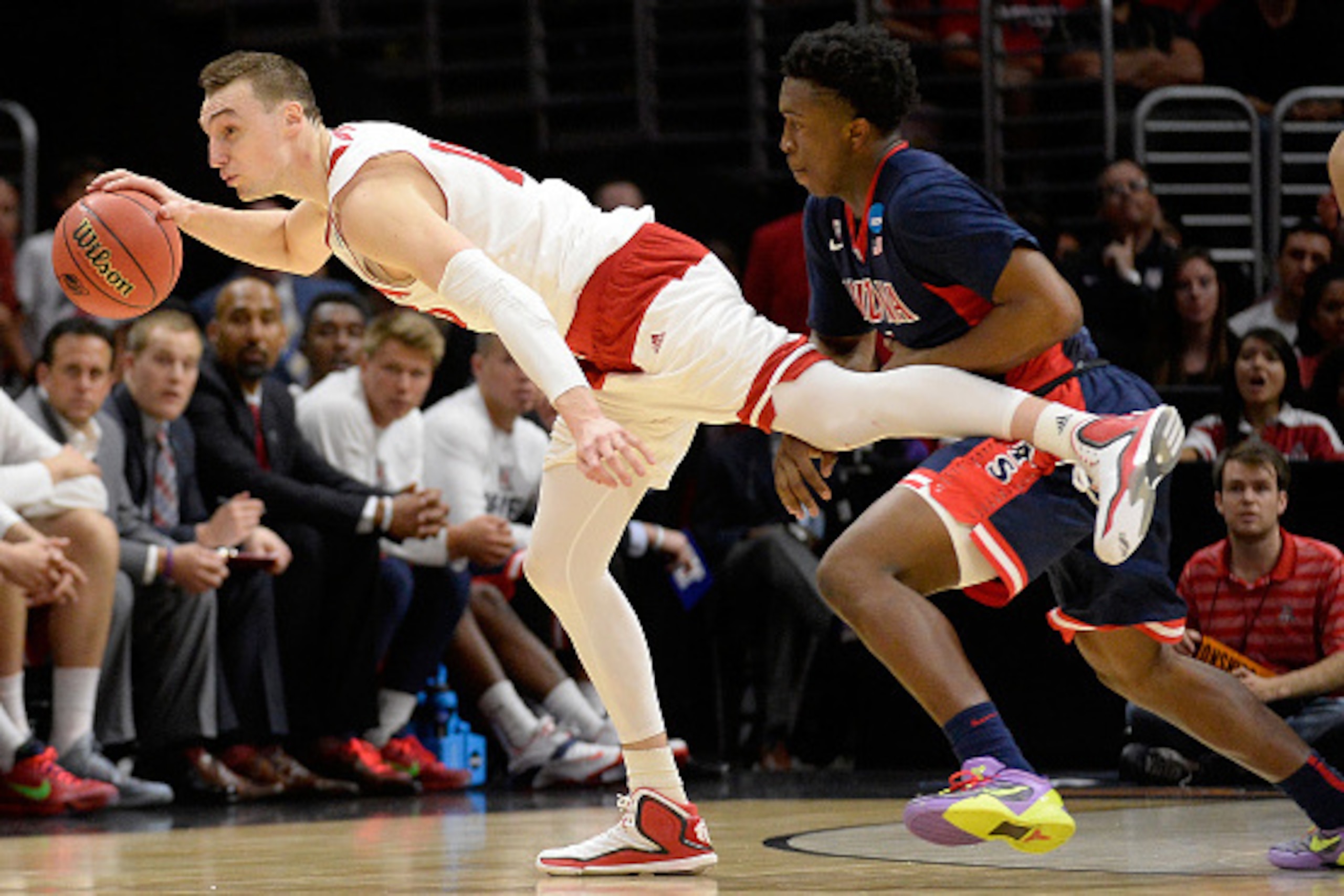 LOS ANGELES, CA - MARCH 28: Sam Dekker #15 of the Wisconsin Badgers with the ball against Stanley Johnson #5 of the Arizona Wildcats in the second half during the West Regional Final of the 2015 NCAA Men's Basketball Tournament at Staples Center on March LOS ANGELES, CA - MARCH 28: Sam Dekker #15 of the Wisconsin Badgers with the ball against Stanley Johnson #5 of the Arizona Wildcats in the second half during the West Regional Final of the 2015 NCAA Men's Basketball Tournament at Staples Center on March