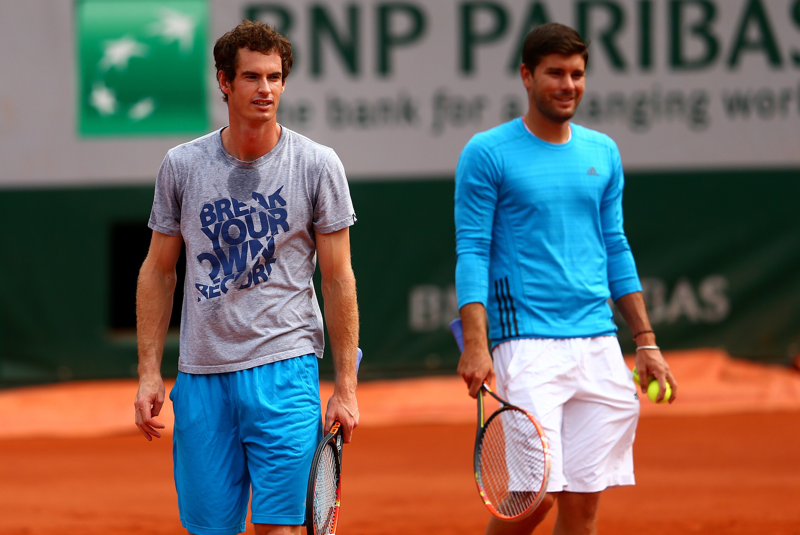 PARIS, FRANCE - JUNE 03:  Andy Murray of Great Britain talks with Dani Vallverdu during a practice session on day ten of the French Open at Roland Garros on June 3, 2014 in Paris, France.  (Photo by Dan Istitene/Getty Images)