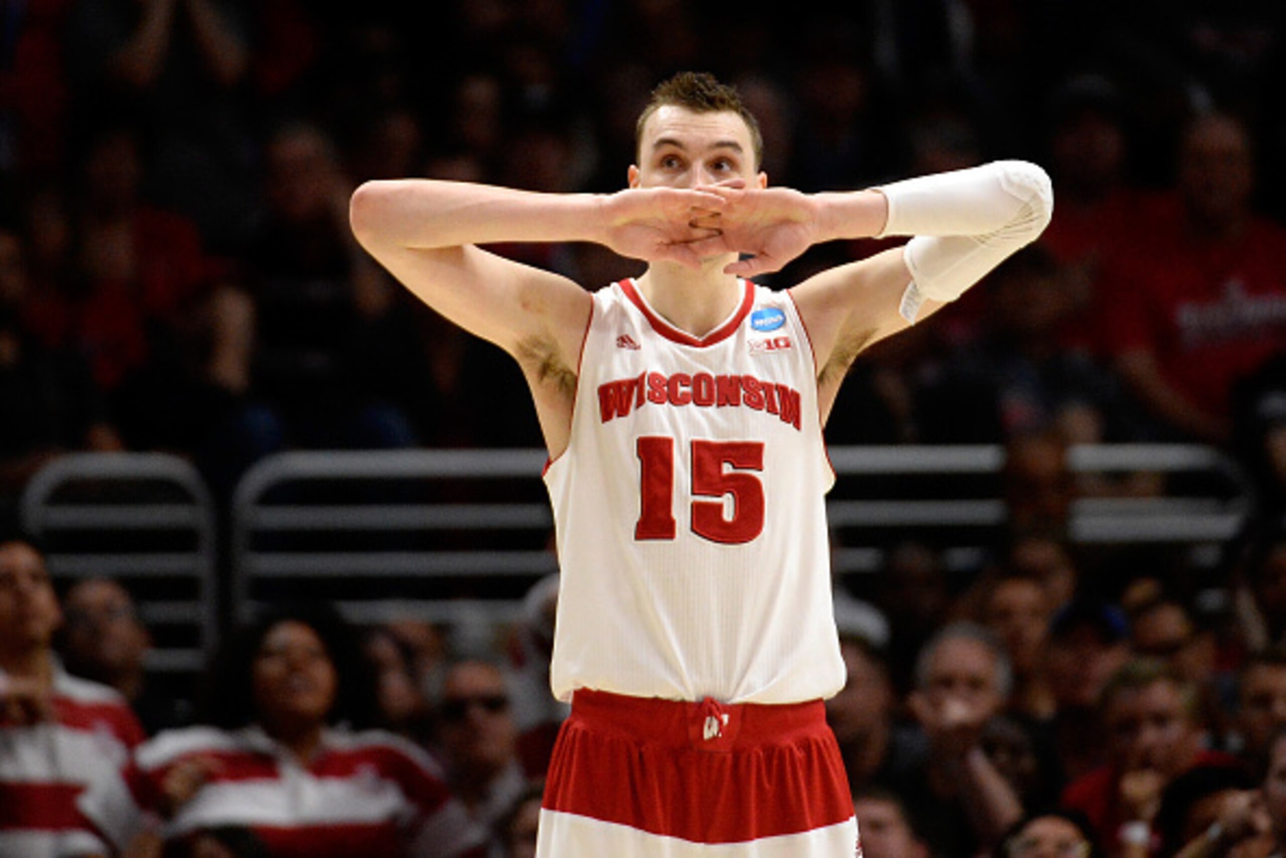 LOS ANGELES, CA - MARCH 28:  Sam Dekker #15 of the Wisconsin Badgers reacts in the second half while taking on the Arizona Wildcats during the West Regional Final of the 2015 NCAA Men's Basketball Tournament at Staples Center on March 28, 2015 in Los Ange