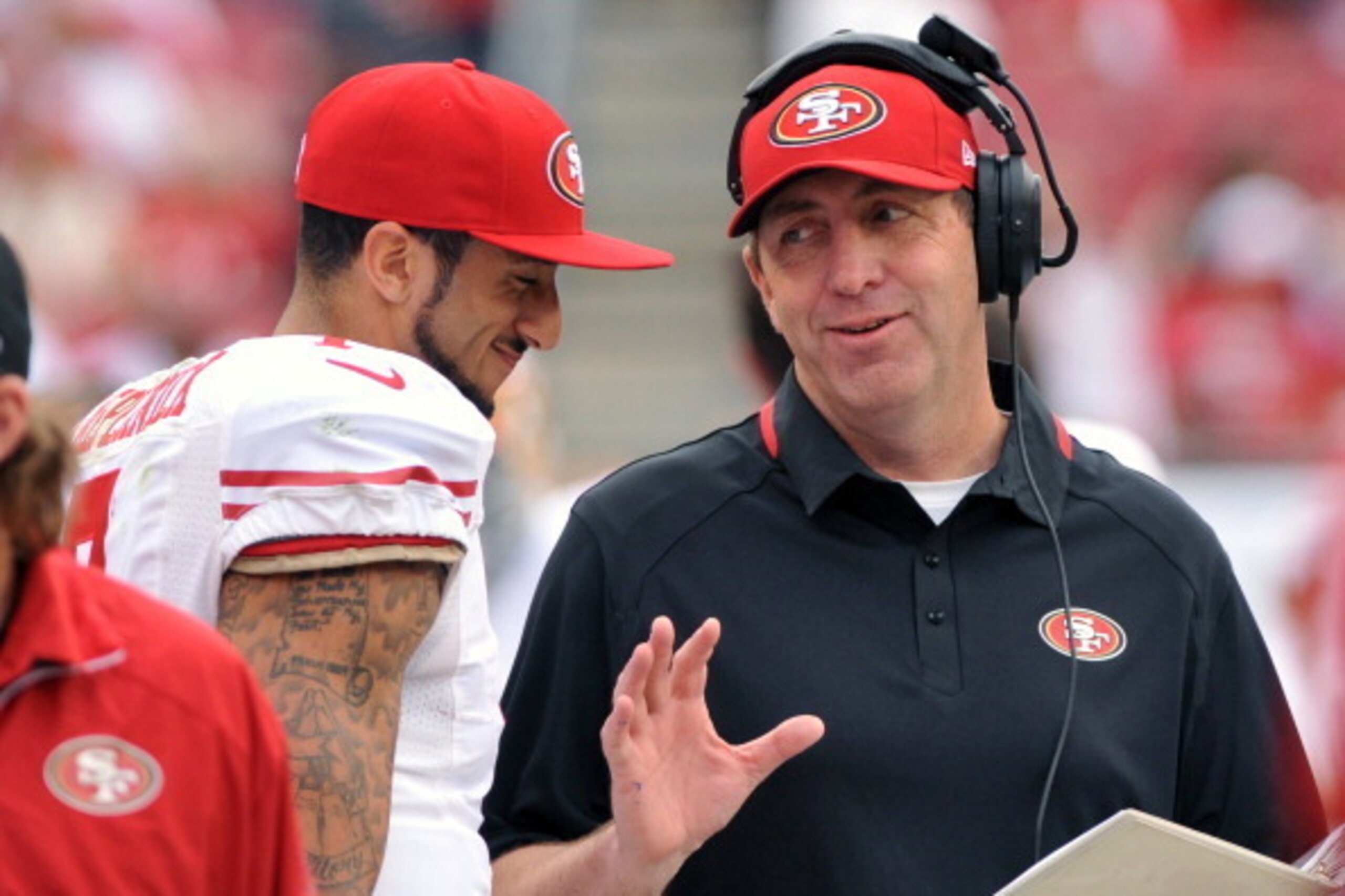 TAMPA, FL - DECEMBER 15: Quarterback Colin Kaepernick #7 of the San Francisco 49ers talks with quarterbacks coach Geep Chryst during play against the Tampa Bay Buccaneers December 15, 2013 at Raymond James Stadium in Tampa, Florida. (Photo by Al Messers TAMPA, FL - DECEMBER 15: Quarterback Colin Kaepernick #7 of the San Francisco 49ers talks with quarterbacks coach Geep Chryst during play against the Tampa Bay Buccaneers December 15, 2013 at Raymond James Stadium in Tampa, Florida. (Photo by Al Messers