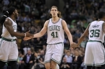 Apr 1, 2015; Boston, MA, USA; Boston Celtics center Kelly Olynyk (41) is congratulated by forward Jae Crowder (99) and guard Marcus Smart (36) after making a basket during the second half against the Indiana Pacers at TD Garden. Mandatory Credit: Bob DeCh Apr 1, 2015; Boston, MA, USA; Boston Celtics center Kelly Olynyk (41) is congratulated by forward Jae Crowder (99) and guard Marcus Smart (36) after making a basket during the second half against the Indiana Pacers at TD Garden. Mandatory Credit: Bob DeCh