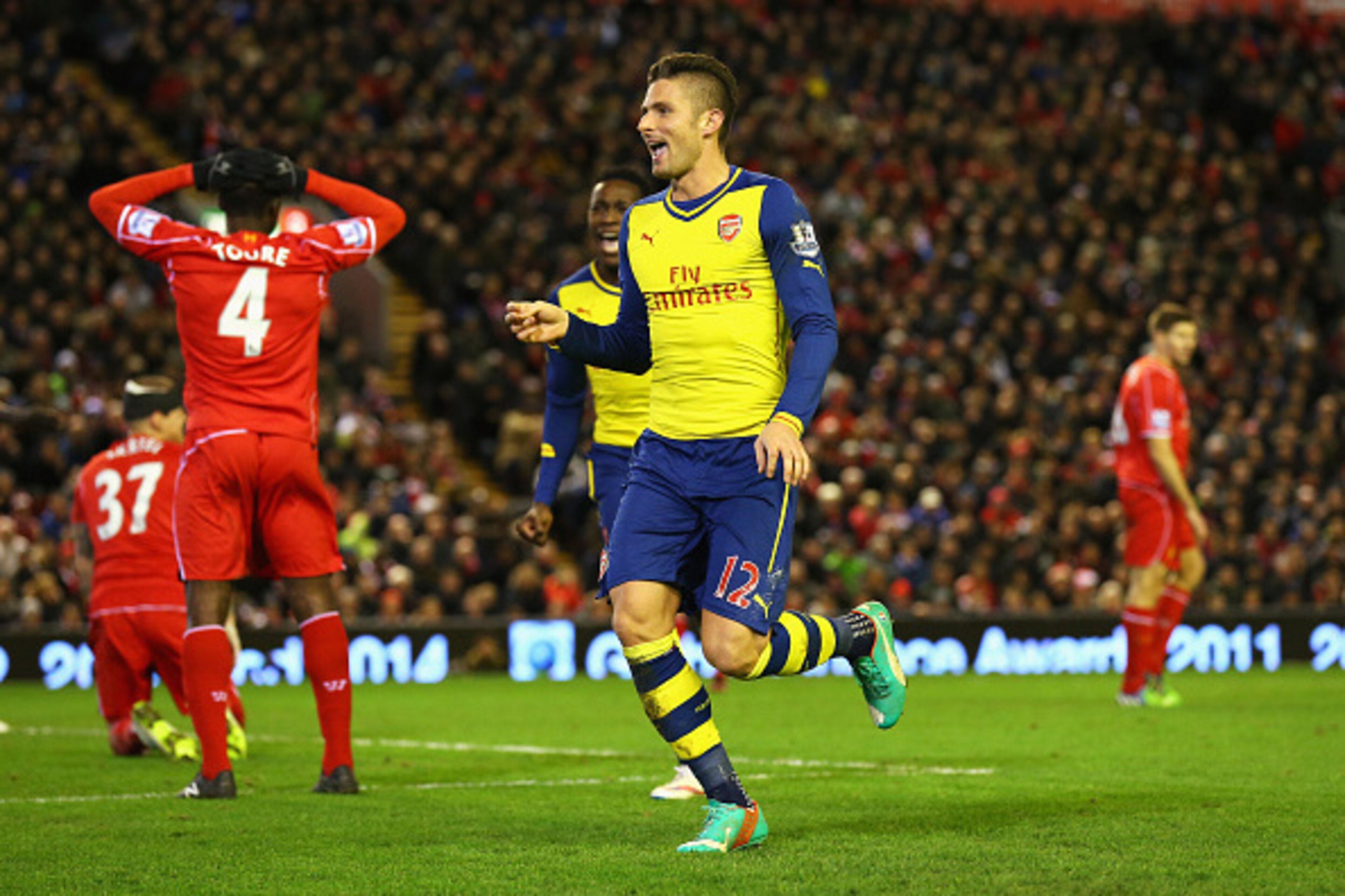 LIVERPOOL, ENGLAND - DECEMBER 21:  Olivier Giroud of Arsenal celebrates scoring his goal during the Barclays Premier League match between Liverpool and Arsenal at Anfield on December 21, 2014 in Liverpool, England.  (Photo by Alex Livesey/Getty Images)
