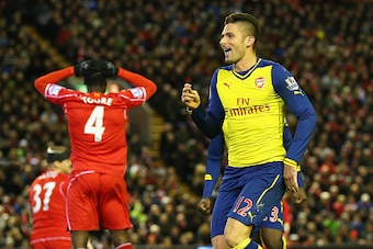 LIVERPOOL, ENGLAND - DECEMBER 21:  Olivier Giroud of Arsenal celebrates scoring his goal during the Barclays Premier League match between Liverpool and Arsenal at Anfield on December 21, 2014 in Liverpool, England.  (Photo by Alex Livesey/Getty Images)