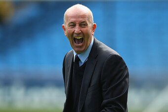 MANCHESTER, ENGLAND - MARCH 21:  Tony Pulis the manager of West Bromwich Albion shares a joke as he arrives at the Etihad Stadium prior to the Barclays Premier League match between Manchester City and West Bromwich Albion at Etihad Stadium on March 21, 20