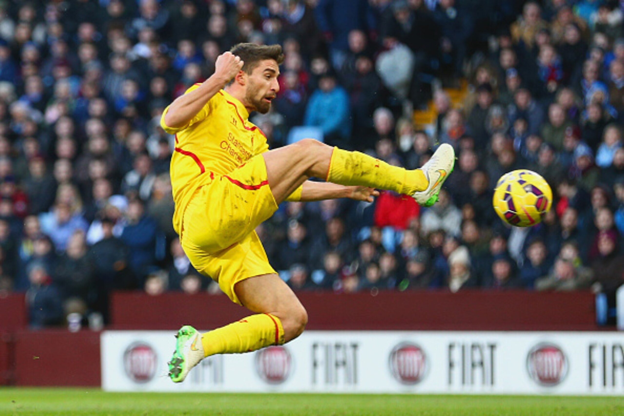BIRMINGHAM, ENGLAND - JANUARY 17:  Fabio Borini of Liverpool scores the opening goal during the Barclays Premier League match between Aston Villa and Liverpool at Villa Park on January 17, 2015 in Birmingham, England.  (Photo by Clive Mason/Getty Images)