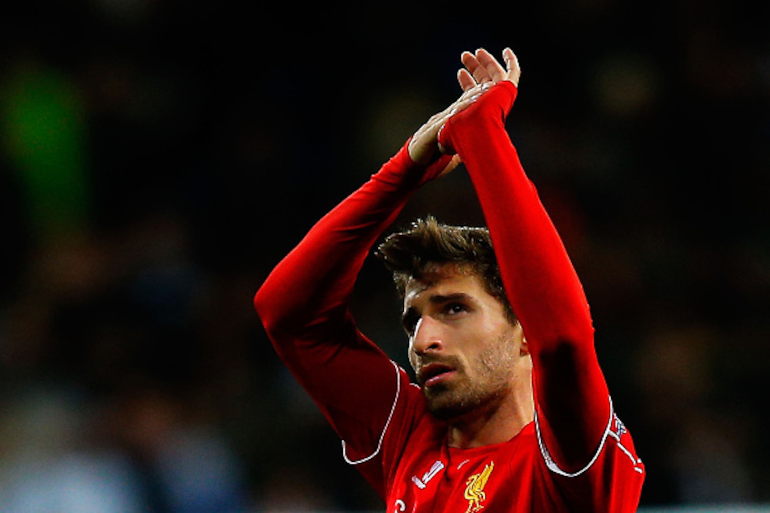 MADRID, SPAIN - NOVEMBER 04:  Fabio Borini of Liverpool FC claps Liverpool FC fans afterg the UEFA Champions League Group B match between Real Madrid CF and Liverpool FC at Estadio Santiago Bernabeu on November 4, 2014 in Madrid, Spain.  (Photo by Gonzalo