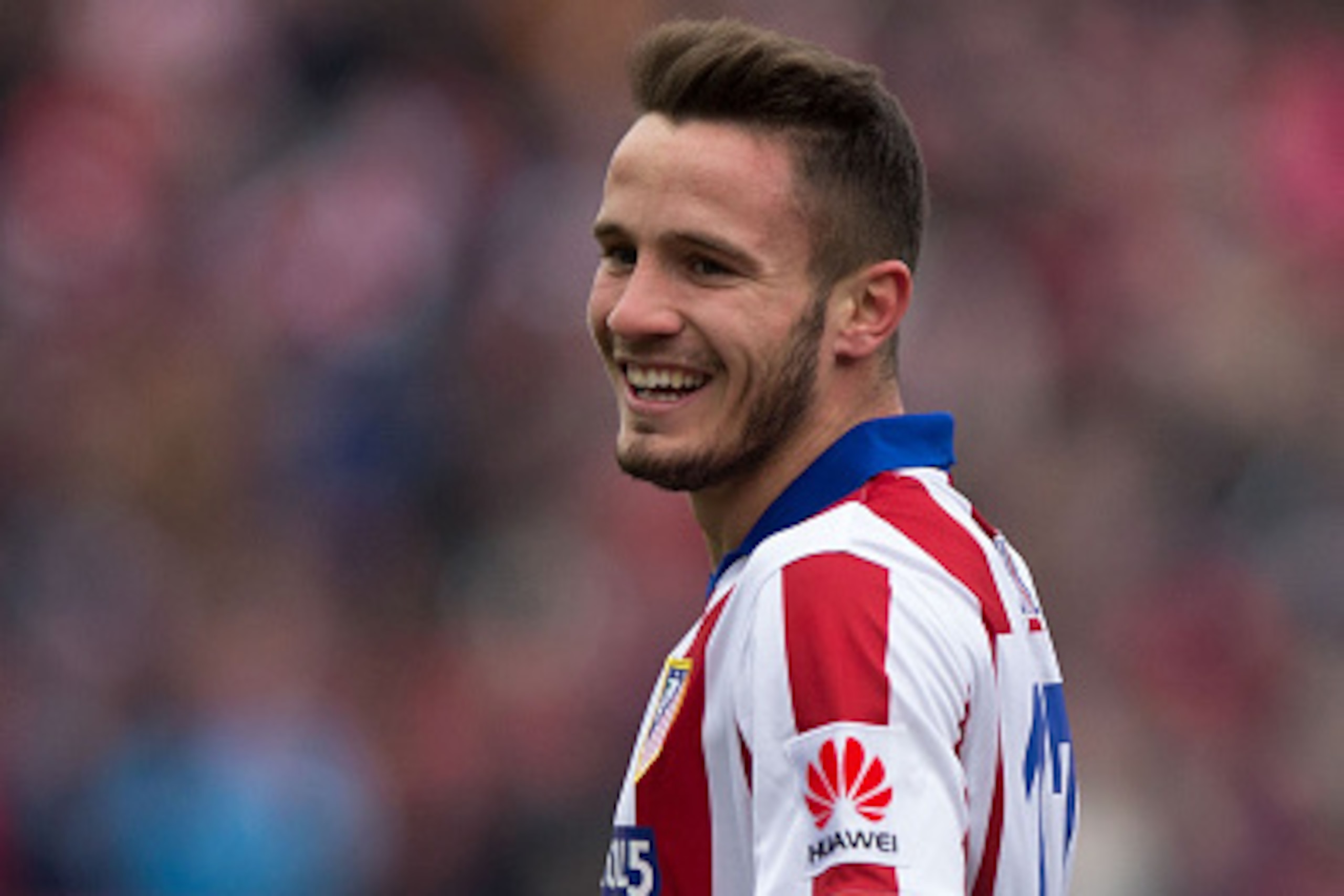 MADRID, SPAIN - FEBRUARY 07:  Saul Niguez of Atletico de Madrid celebrates scoring their second goal during the La Liga match between Club Atletico de Madrid and Real Madrid CF at Vicente Calderon Stadium on February 7, 2015 in Madrid, Spain.  (Photo by G